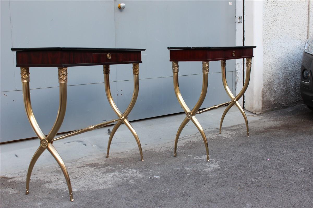 Neoclassical pair of console Paolo Buffa midcentury Italian design brass black marble 1950 mahogany wood.
Mahogany wood structure, highly elegant polished black marble top,
shaped brass foot, central drawer, probable manufacture and design by