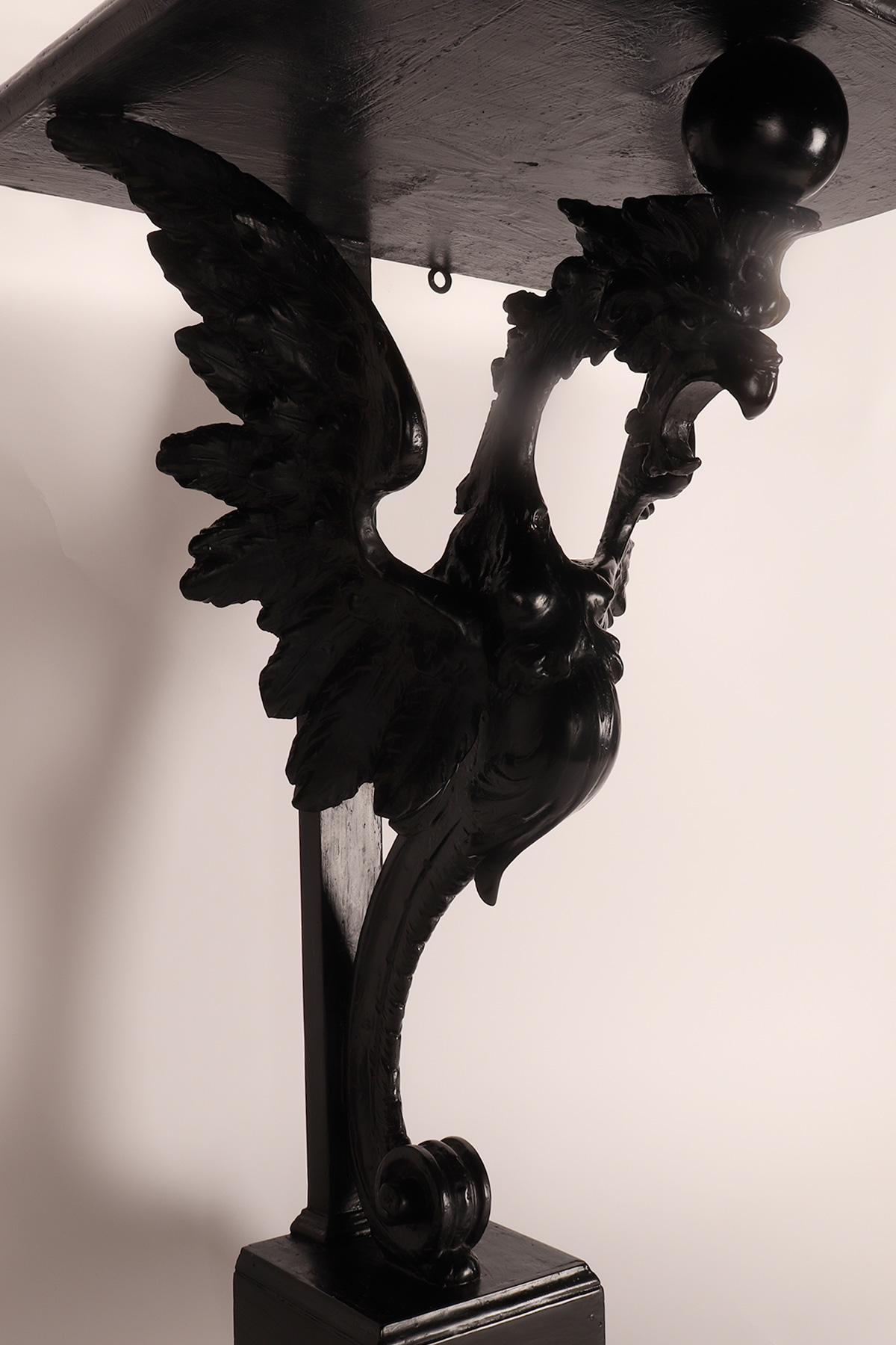 Italian Pair of console tables with griffons in ebonized walnut wood, Italy 1860. For Sale