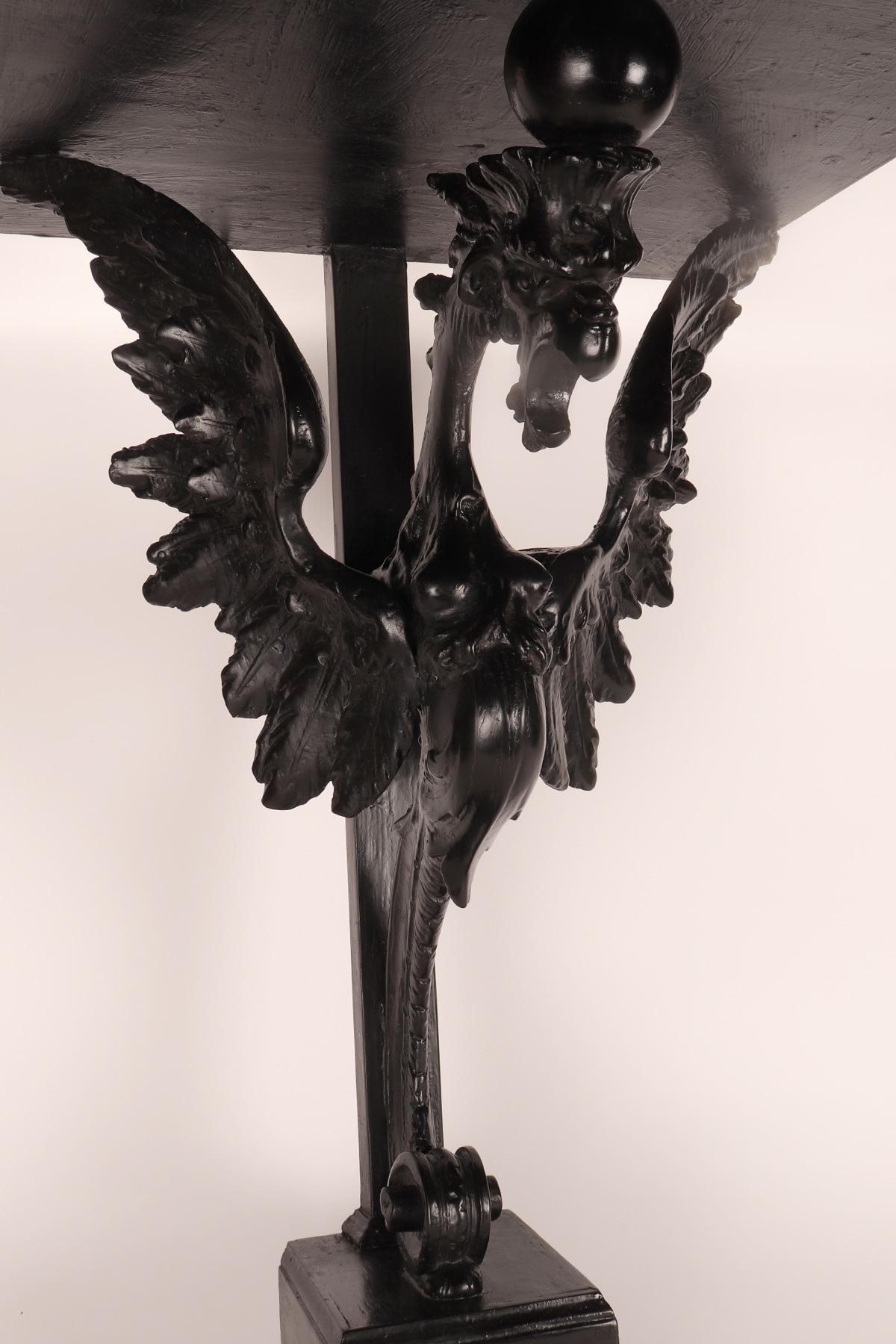 19th Century Pair of console tables with griffons in ebonized walnut wood, Italy 1860. For Sale