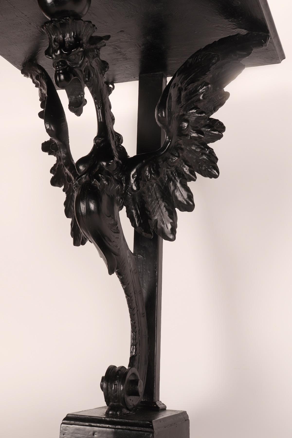 Wood Pair of console tables with griffons in ebonized walnut wood, Italy 1860. For Sale