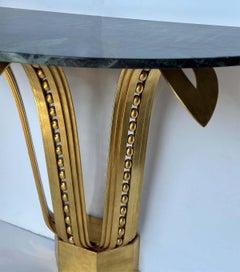 Coppia di consolle con foglia d'oro e piano in marmo nello stile di Raymond Subes