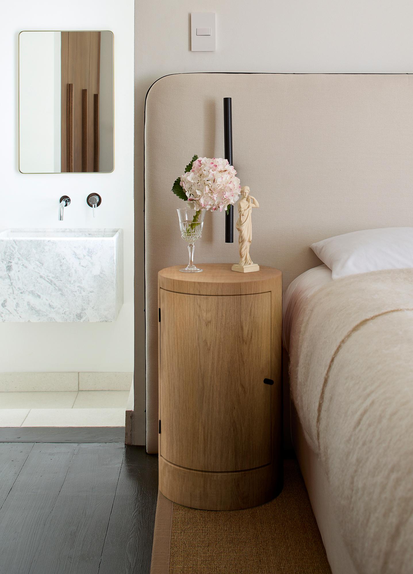 Envisioned by designer Yaniv Chen, the Constant nightstand exudes an air of refined luxury, celebrating the inherent splendor of wood. Meticulously crafted with impeccable proportions and attention to detail, the Constant nightstand stand is your