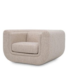 Coppia di poltrone contemporanee in tessuto beige imbottito con piedini in legno nero