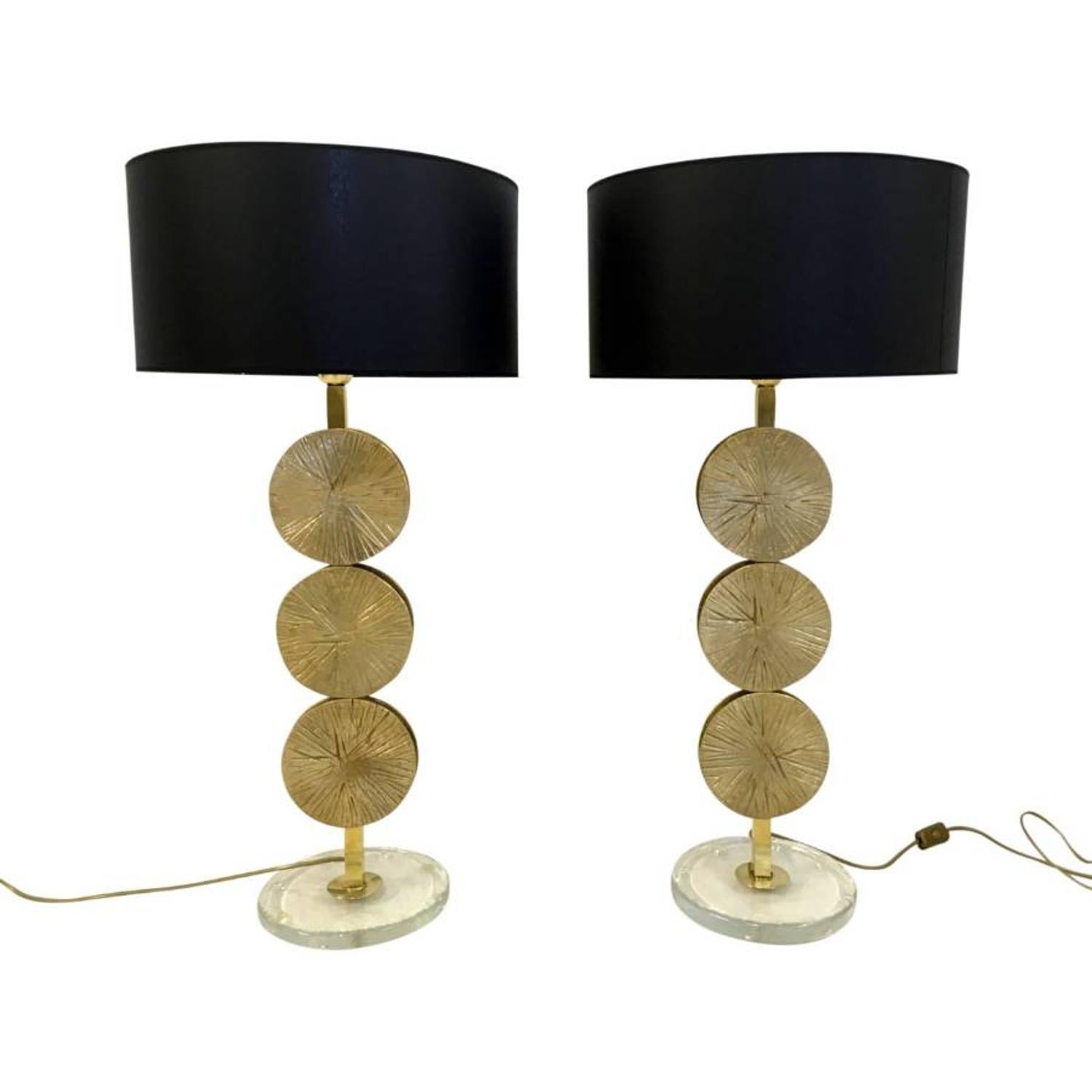 Pair of brass table lamps

Murano glass disc base

Contemporary

Made in a small workshop close to Venice, Italy

Shades not included.
