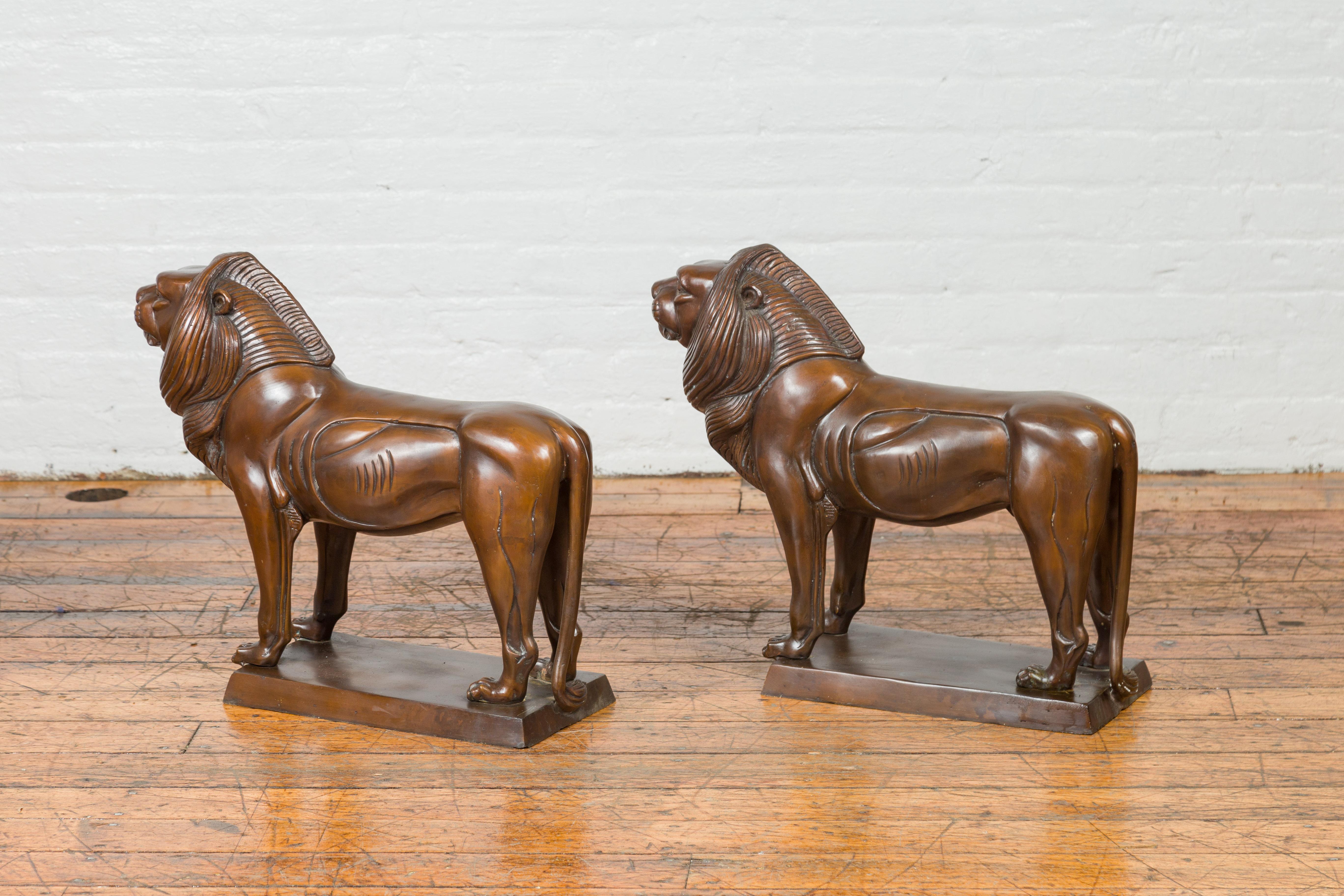 Pair of Contemporary Bronze Lion Sculptures on Bases with Dark Patina For Sale 8