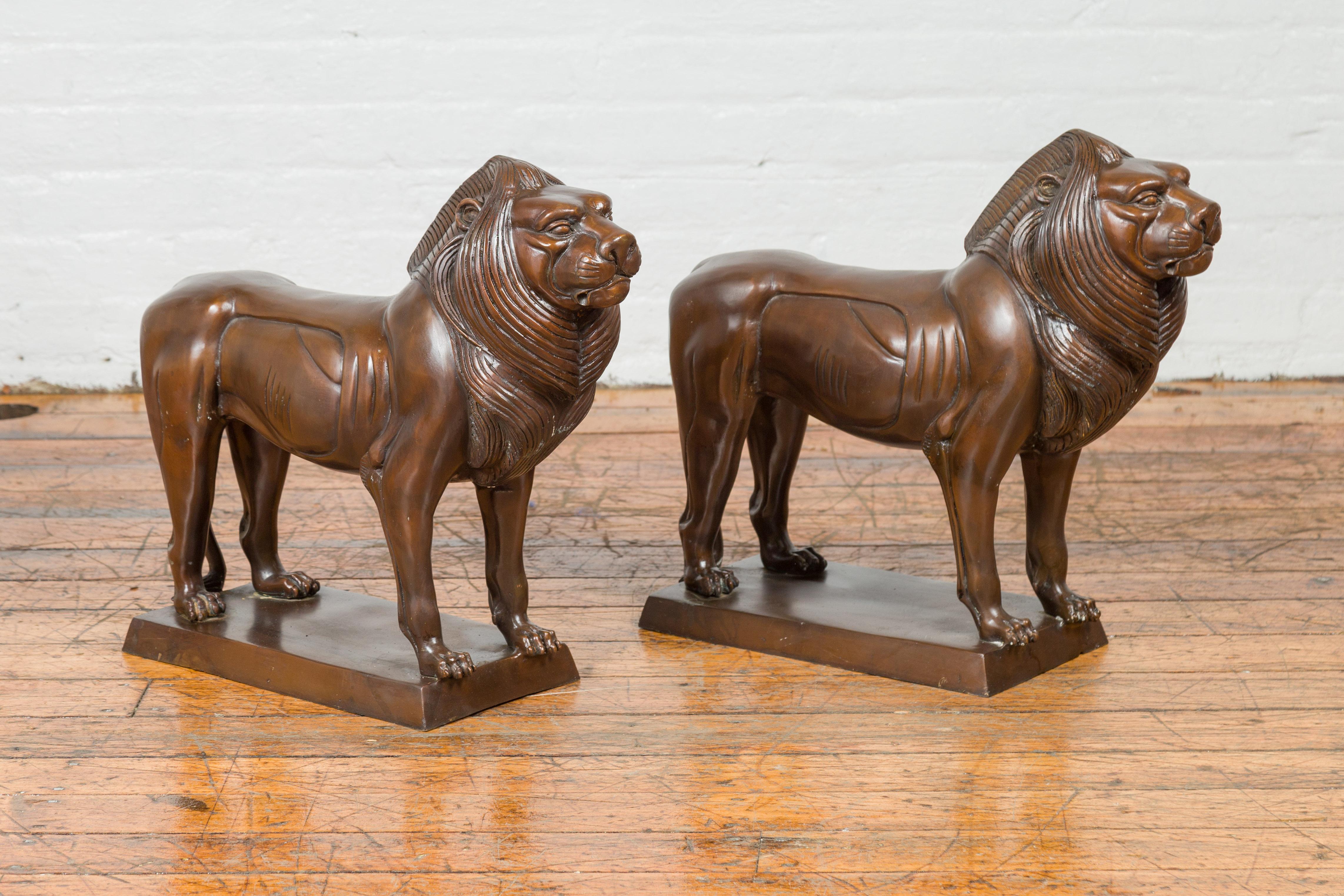 Pair of Contemporary Bronze Lion Sculptures on Bases with Dark Patina For Sale 3