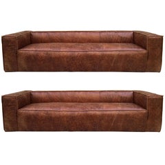 Two Contemporary Distressed Leather Sofas
