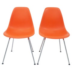 Pair of Contemporary Eames Orange Red Molded Plastic Side Chairs