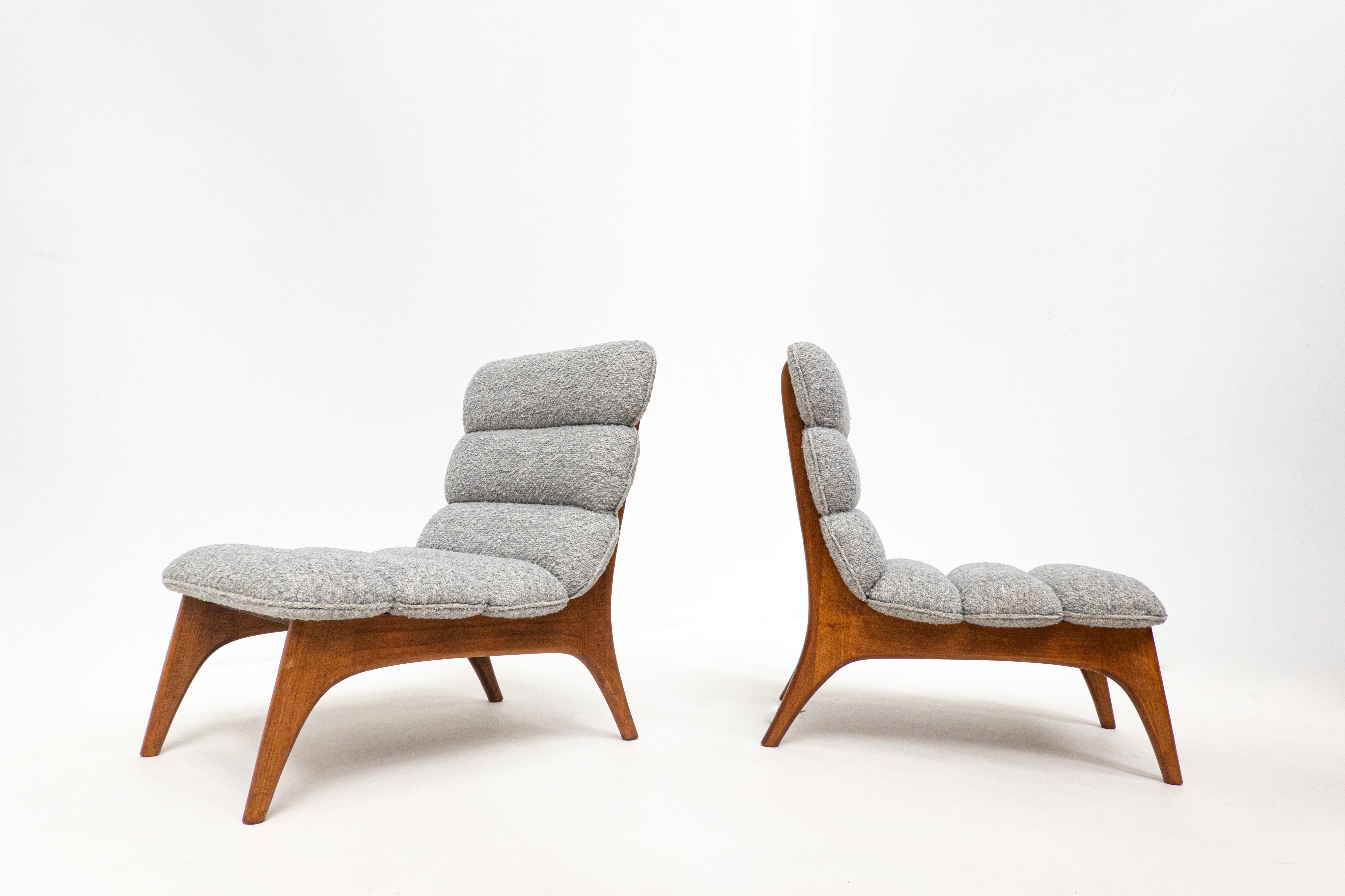 Pair of contemporary easy chairs, wood and fabric, Italy.