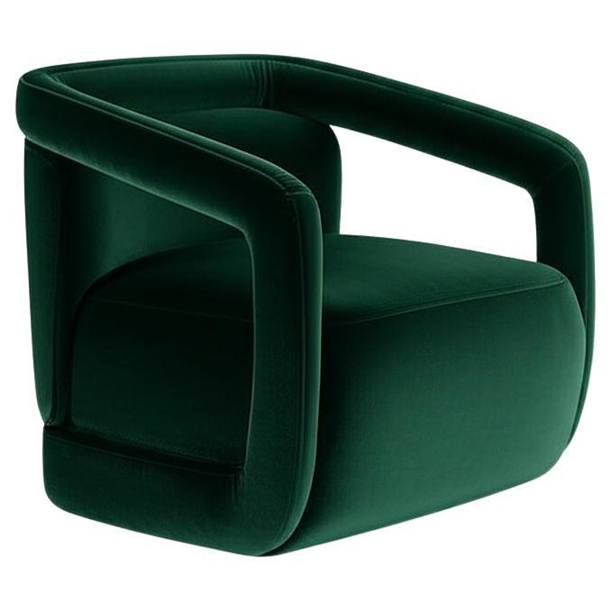This is a modern, upholstered armchair characterized by its distinctive design where the armrests seamlessly connect and flow into the backrest. This creates a continuous, rounded, and enveloping silhouette, offering a sleek and sculptural