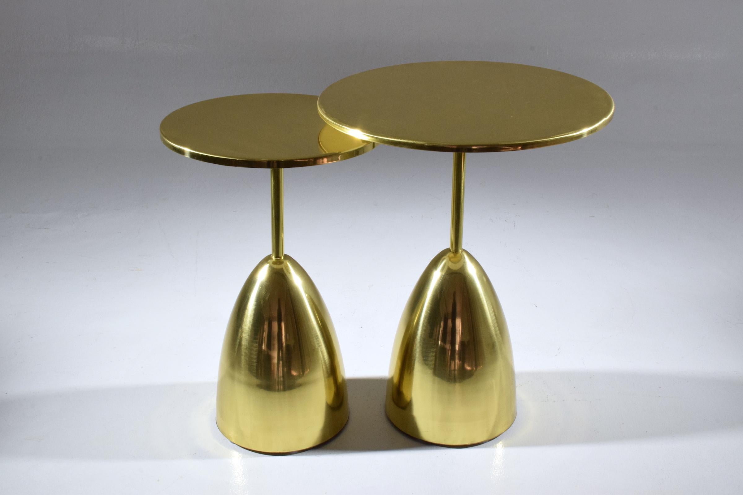Indulge in the ultimate in artisanal luxury with this set of two handcrafted guéridon nesting side or end tables. Made with the utmost care and attention to detail, each table is crafted from the finest brass material and created using traditional