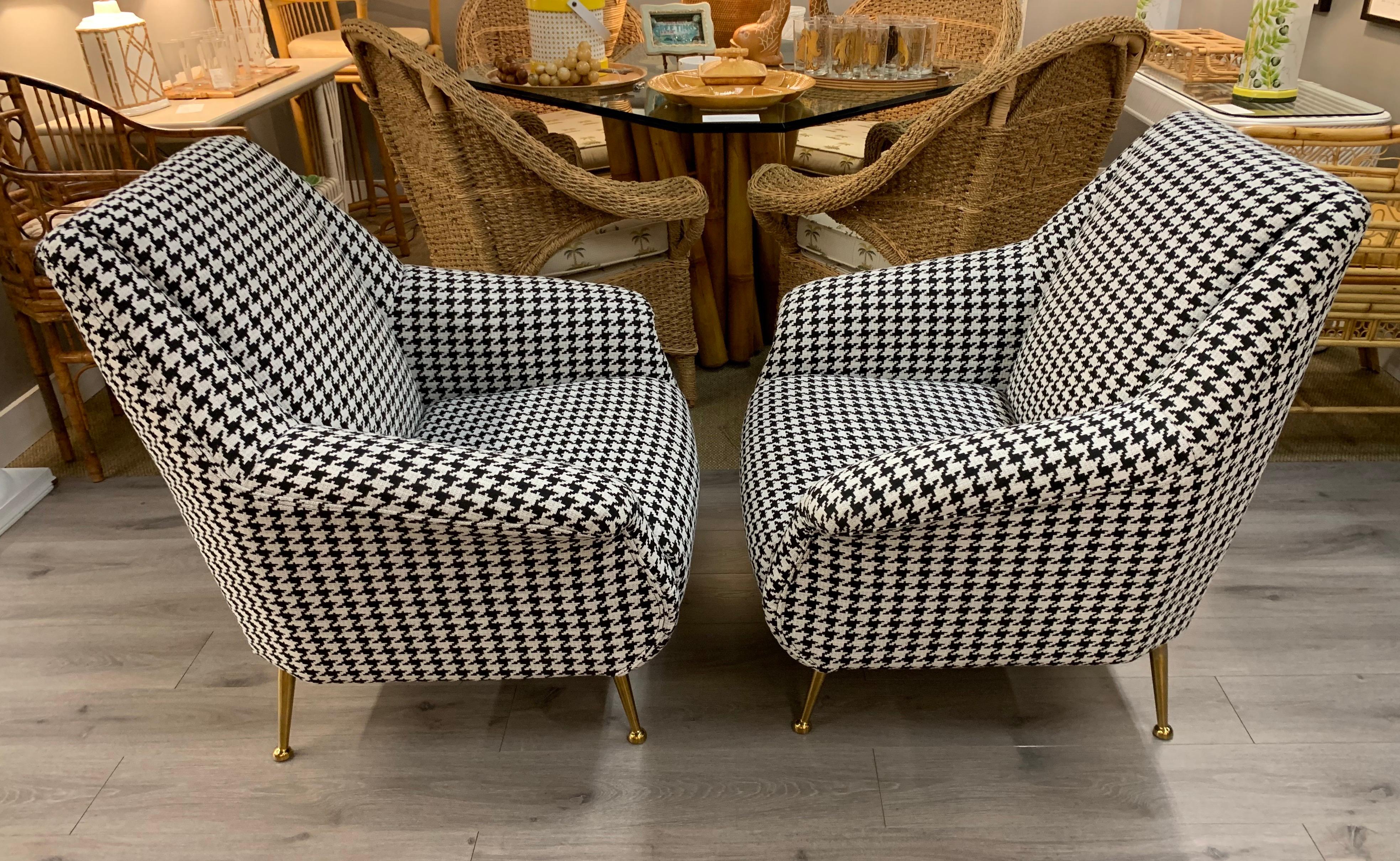 Great looking pair of black and white houndstooth high back chairs with contemporary gold legs. Mint condition.