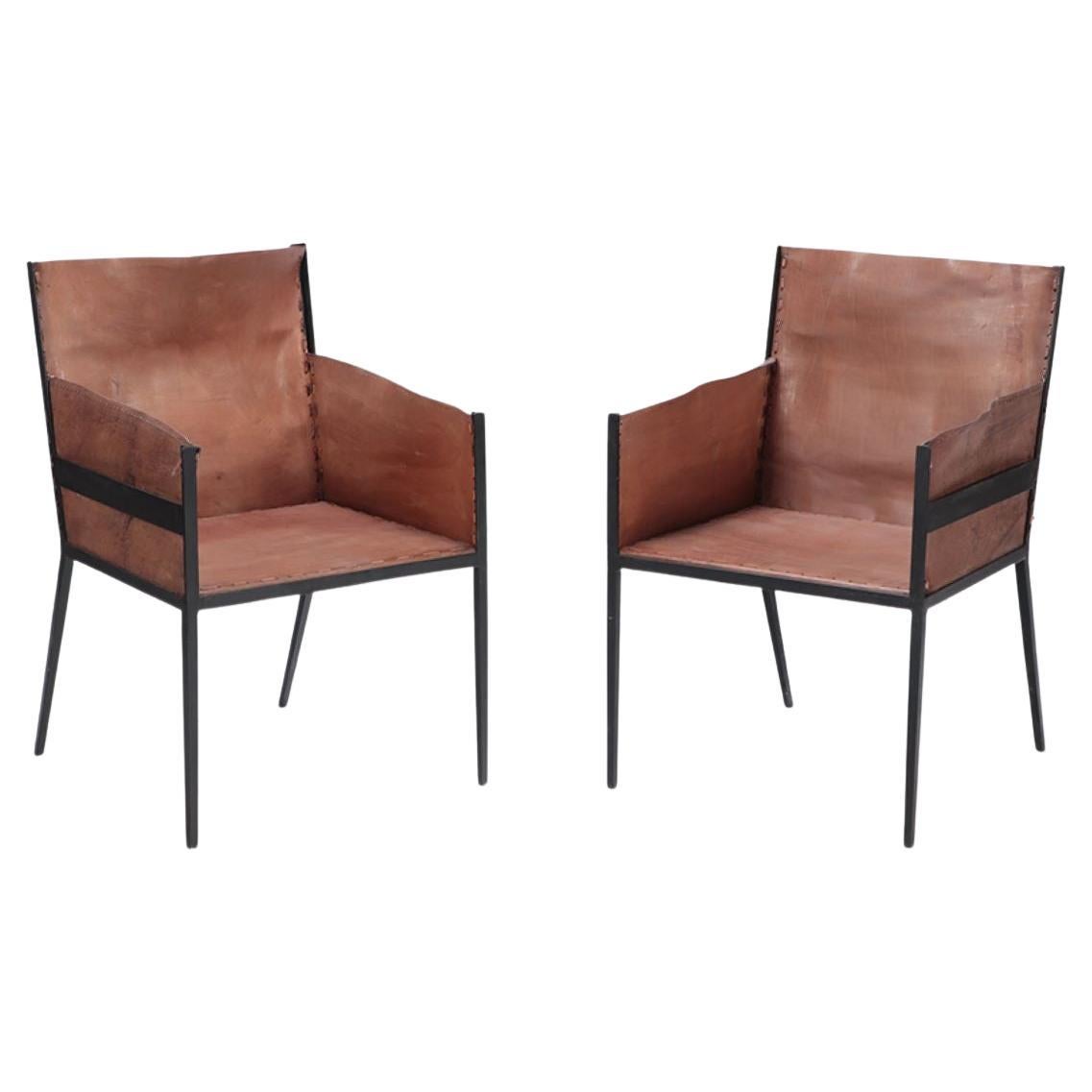 Pair of Contemporary Iron and tailored leather armchairs 