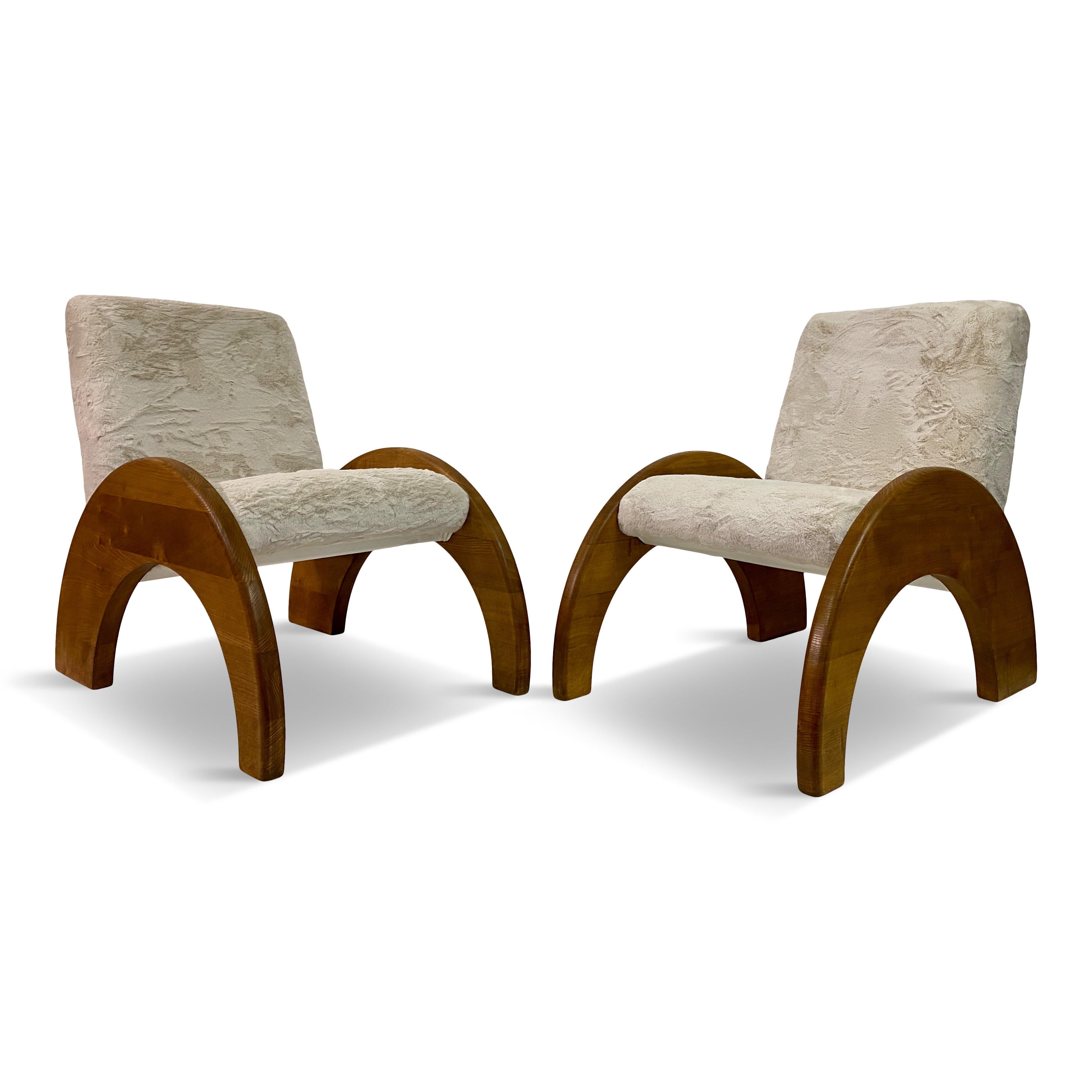 Pair of armchairs

Arched arms and legs

Fake fur upholstery

Seat height 46cm

Contemporary Italy

These in stock but more can be made to order.