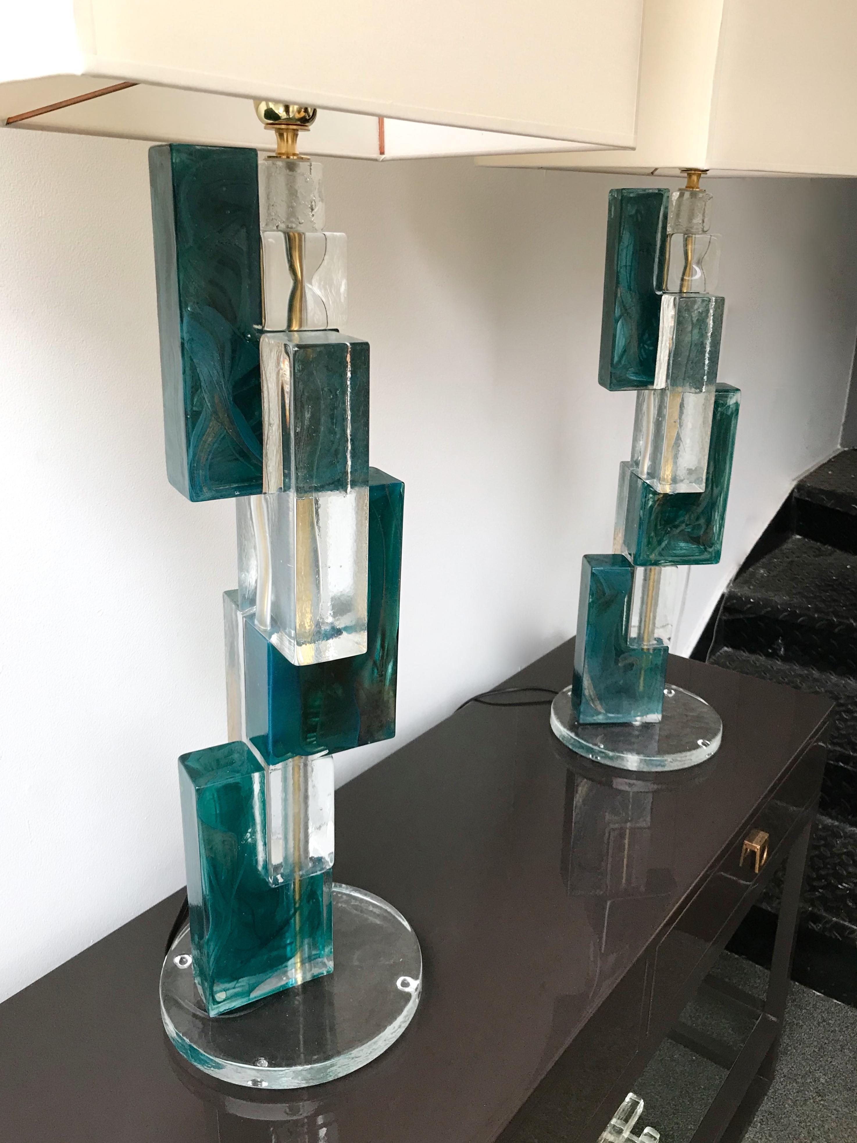 Huge pair of contemporary table lamps cubic pressed Murano glass block and brass elements. Few exclusive production from a small Italian design workshop. In the style of Mazzega, Poliarte, Venini, Vistosi, Carlo Aldo Nason.

Measure: Height top of