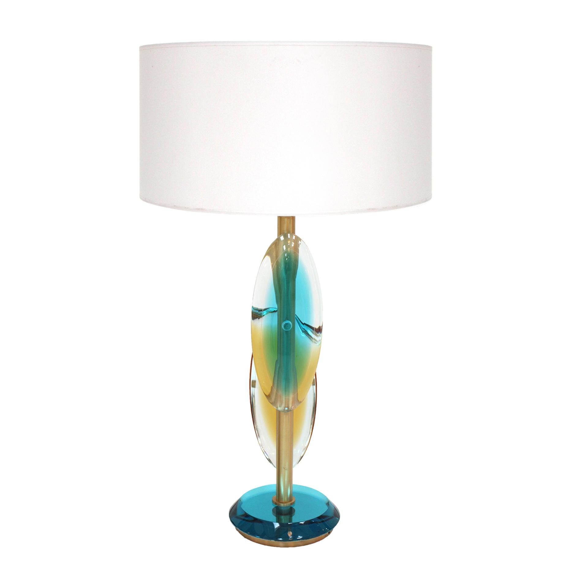Pair of contemporary lamps designed by LA Studio. Structure made of brass with hand-carved antique Murano glass pieces. Handcrafted white lampshades.

Pair of contemporary lamps exclusively designed by LA Studio, characterized by a carefully crafted