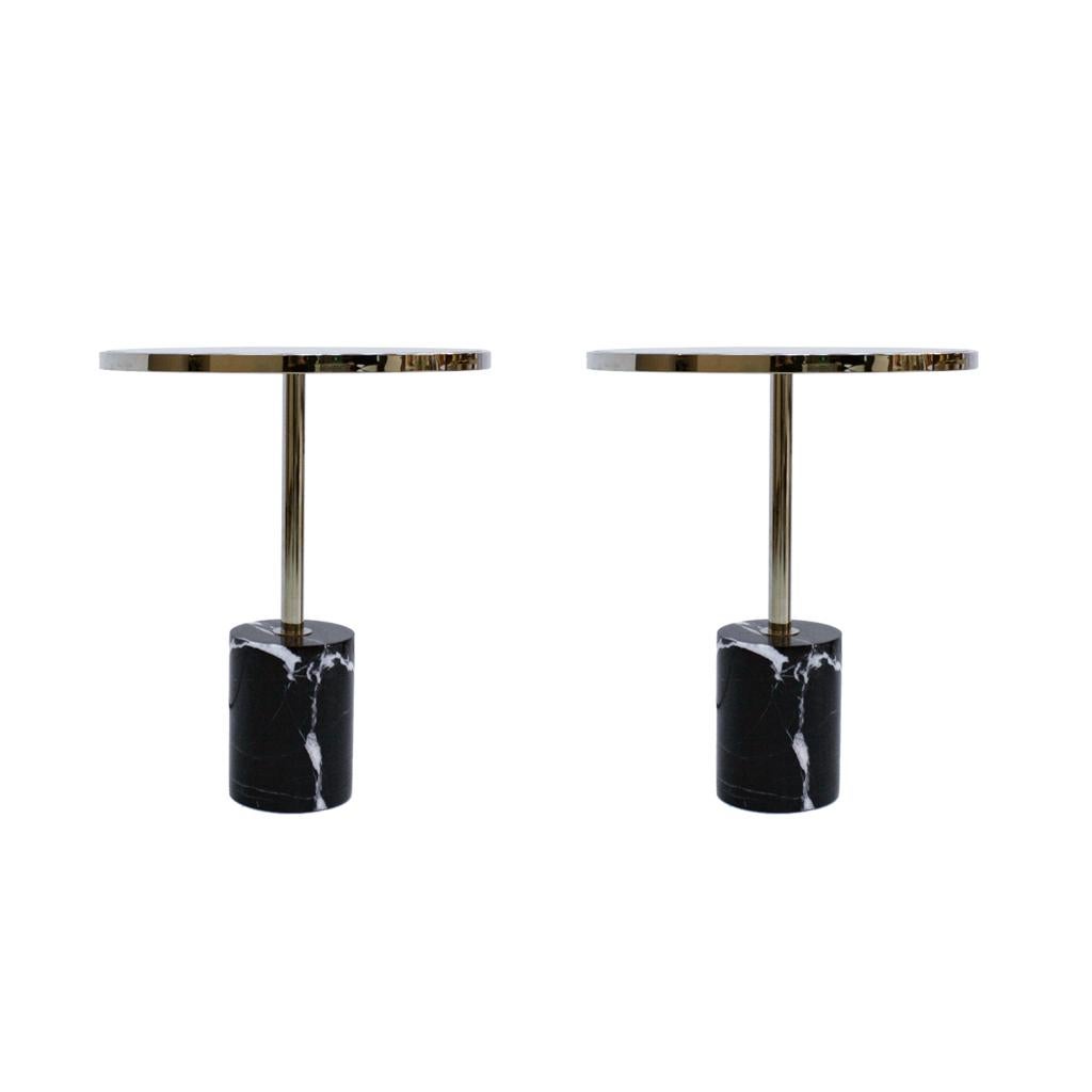 Pair of contemporary Italian tables made of Marquina marble, glass top and brass details.

Every item LA Studio offers is checked by our team of 10 craftsmen in our in-house workshop. Special restoration or reupholstery requests can be done.