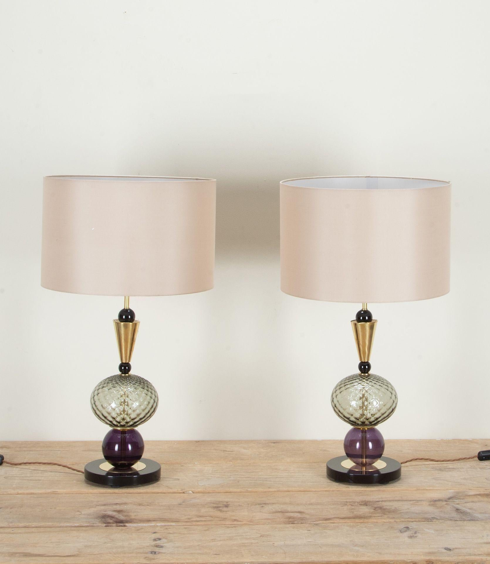 Elegant pair of Contemporary Murano glass table lamps from Italy. 
In aubergine and smoked glass.