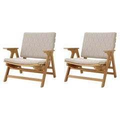 Coppia di poltrone contemporanee da esterno in teak naturale con rivestimento grafico