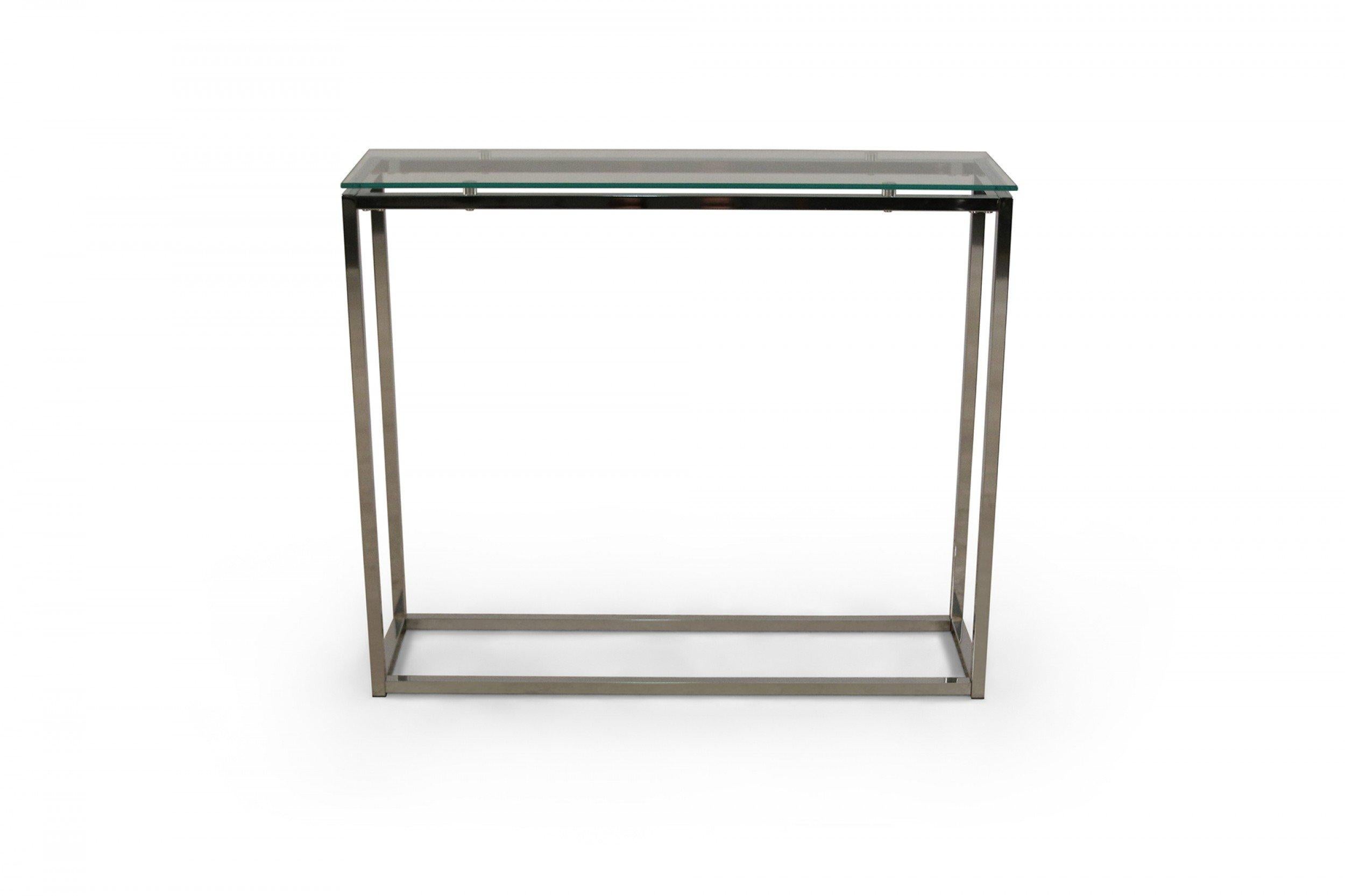 Pair of Contemporary chrome metal narrow rectangular console tables with glass tops. (priced as pair).
     