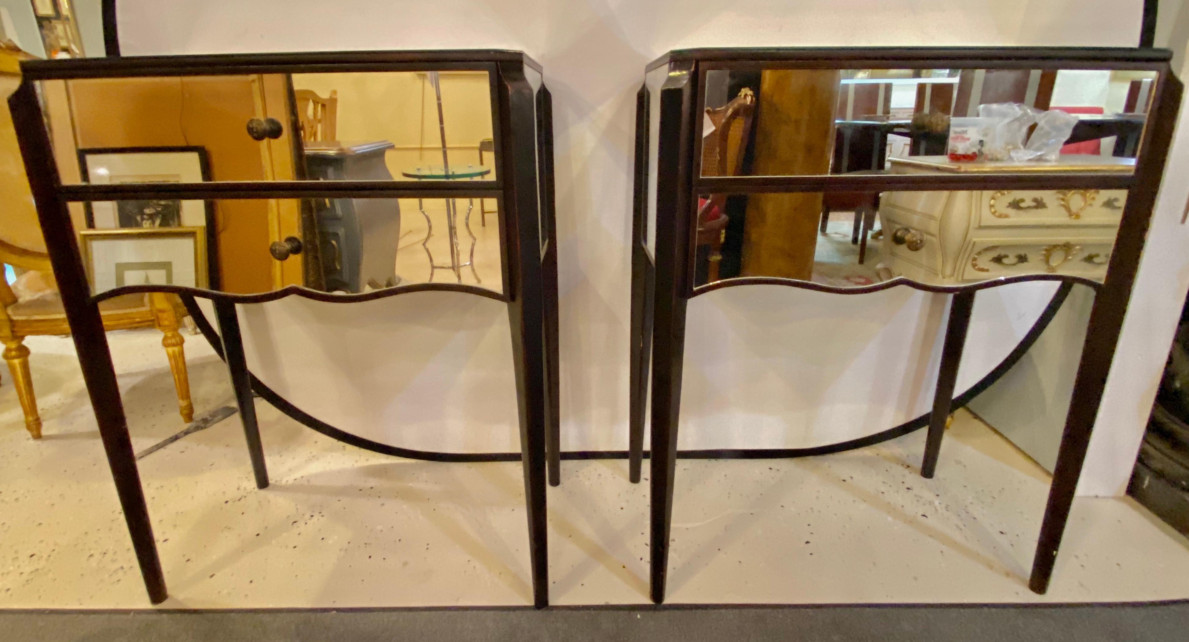Pair of contemporary two-drawer mirrored nightstands or end tables in a very dark brown almost blackish finishes with all mirrored surrounds.