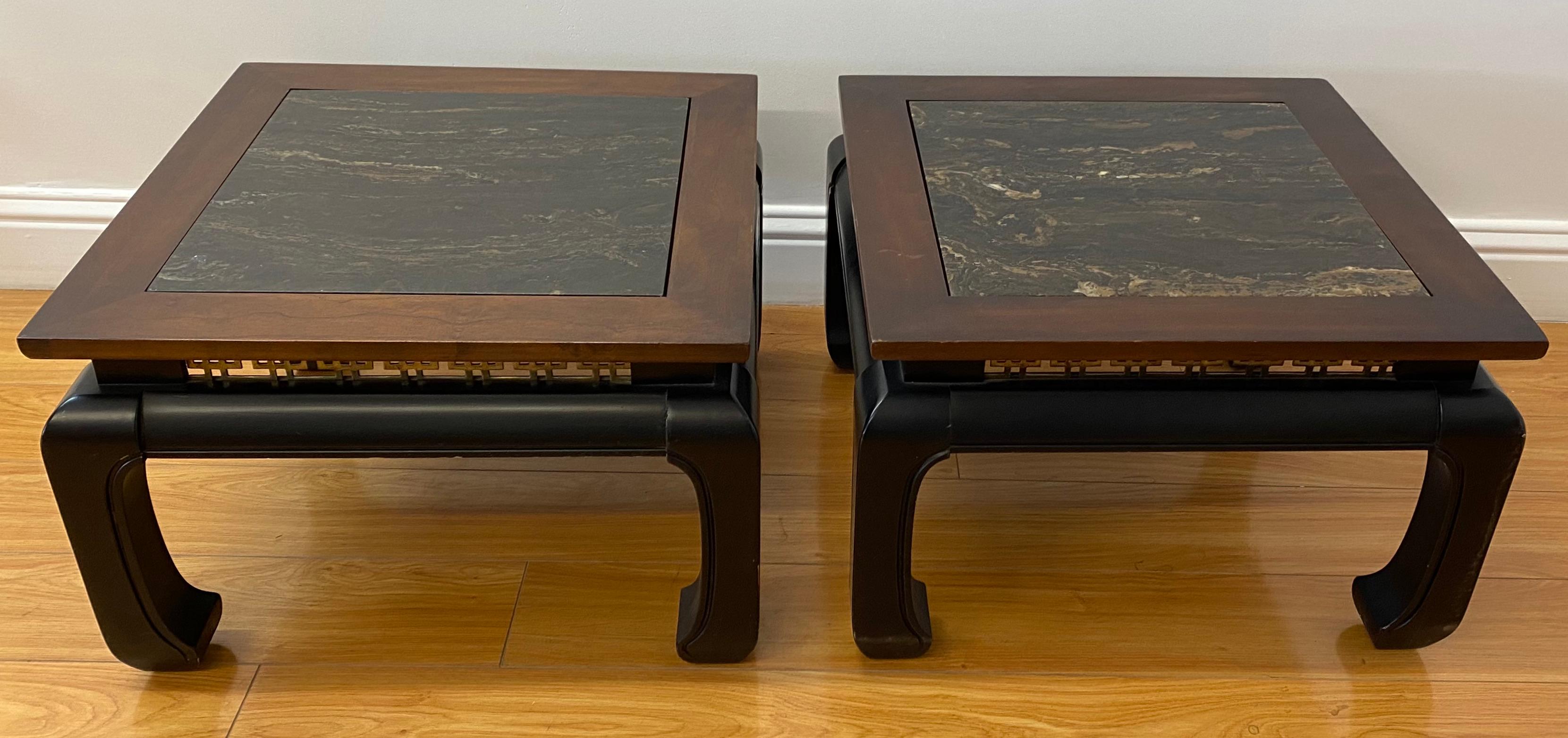 Pair of contemporary walnut, marble & brass side tables

Gorgeous pair of Asian walnut, marble and brass side tables

Each table has an insert marble top and the base is surrounded with brass (see pics)

Each table measures 21.5
