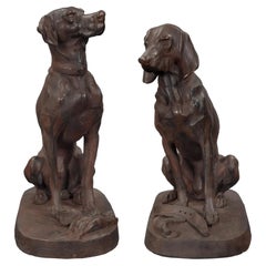 Pair of Continental 20th Century Cast Iron Statues of Two Dogs