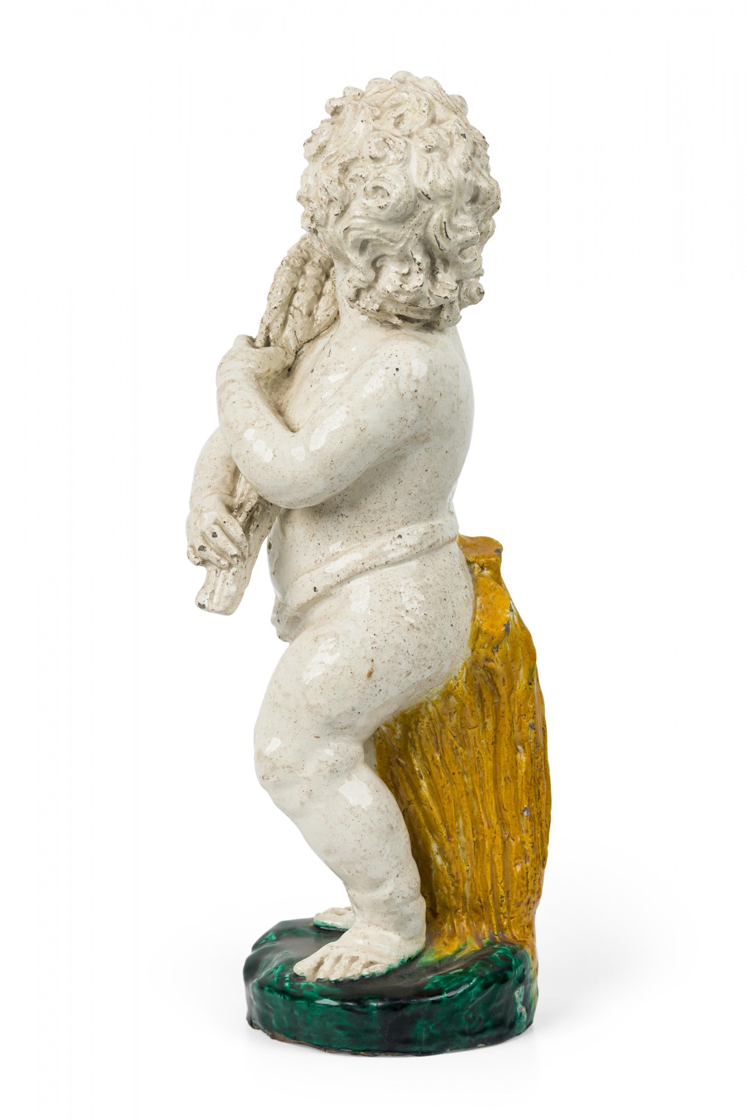 Coppia di figure in maiolica continentale del XIX secolo in vendita 3
