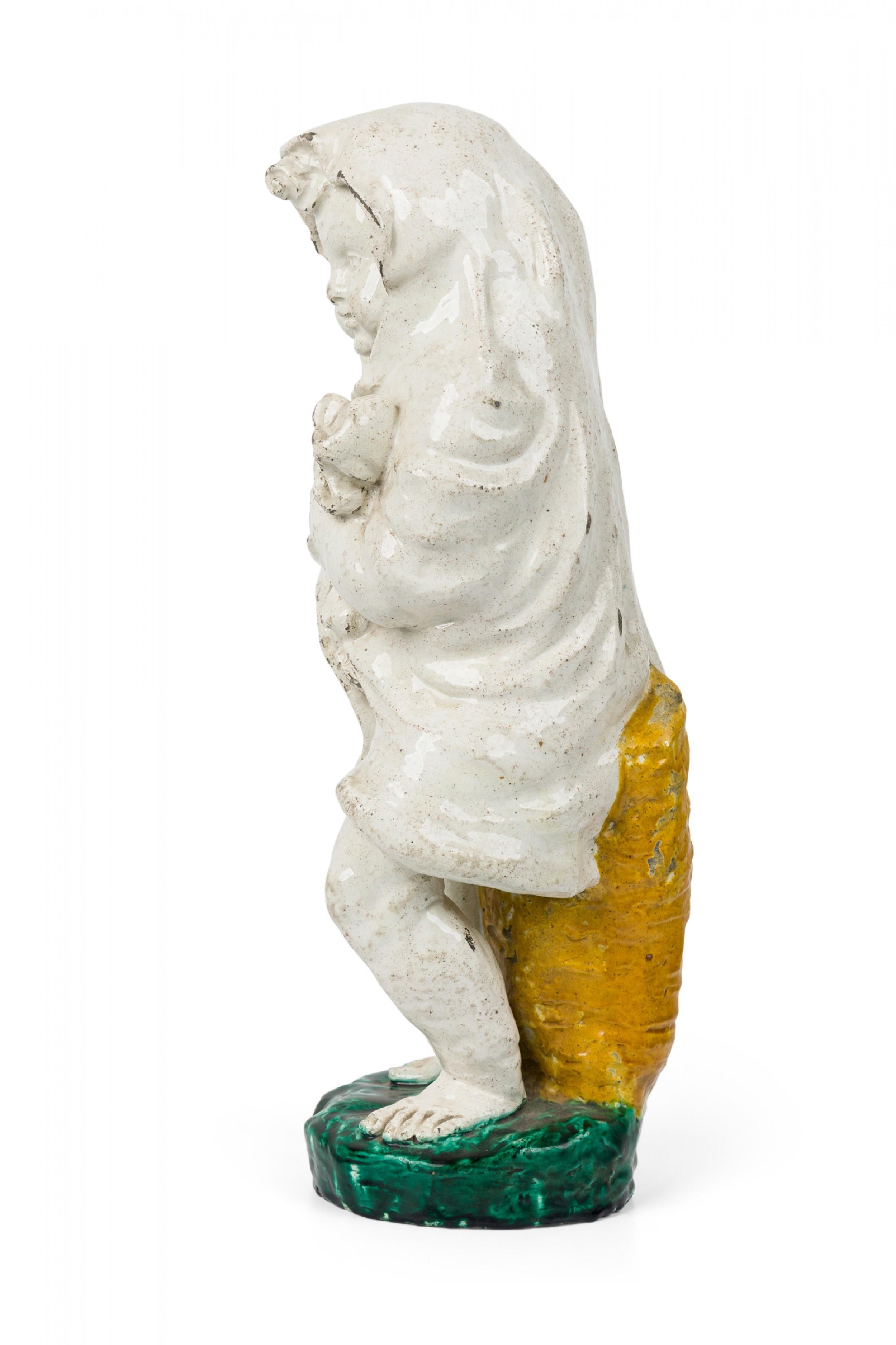 Biedermeier Coppia di figure in maiolica continentale del XIX secolo in vendita