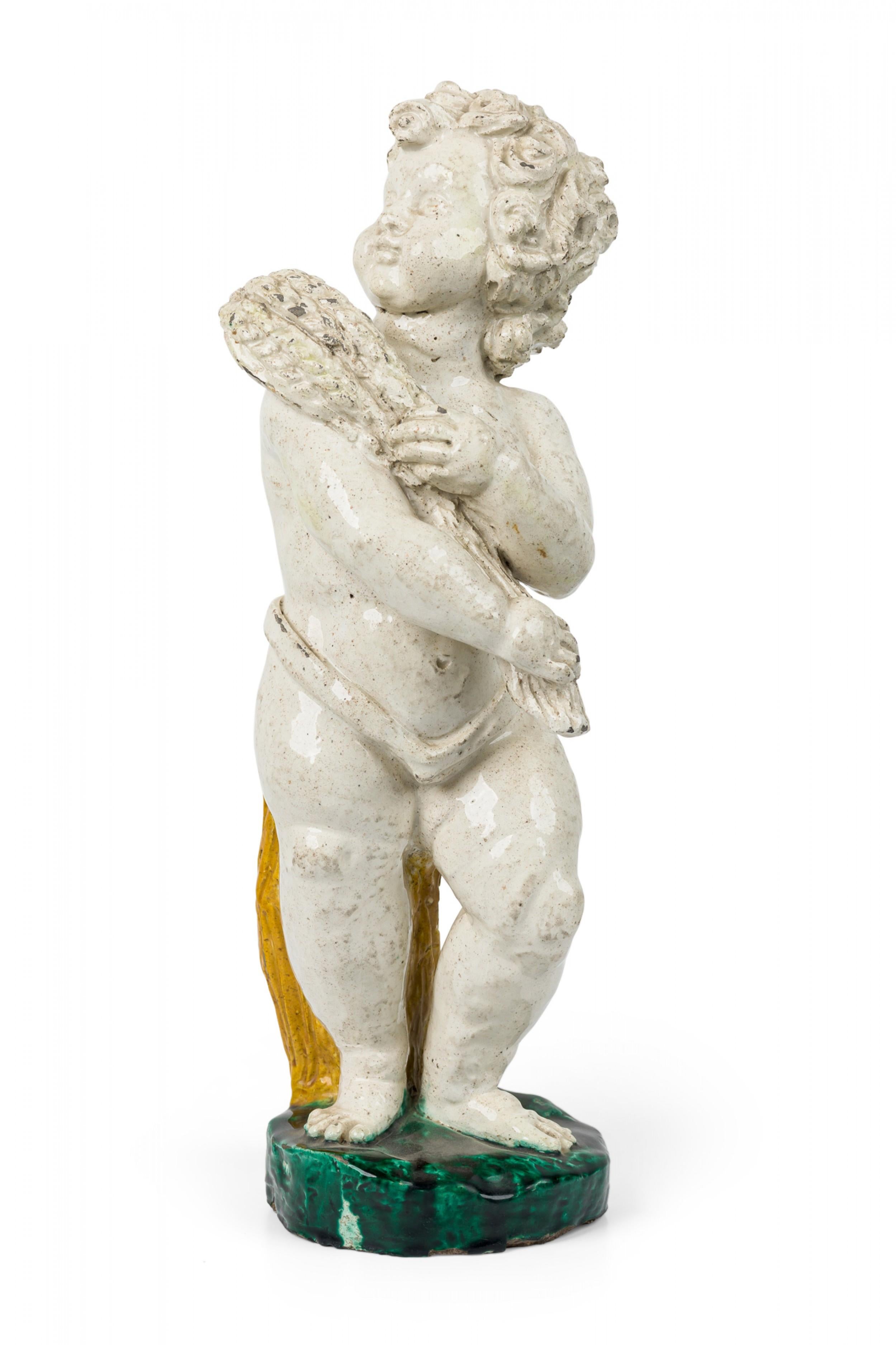 Coppia di figure in maiolica continentale del XIX secolo in vendita 2