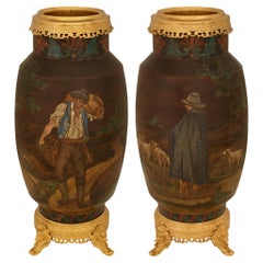 pair of Continental 19th century Terra Cotta and Ormolu urns