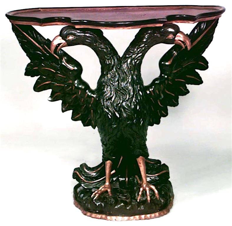 Pair of Continental Austrian/Hungarian (19th Century) double eagle gilt and dark green carved console tables with shaped burl wood top. (PRICED AS Pair)
