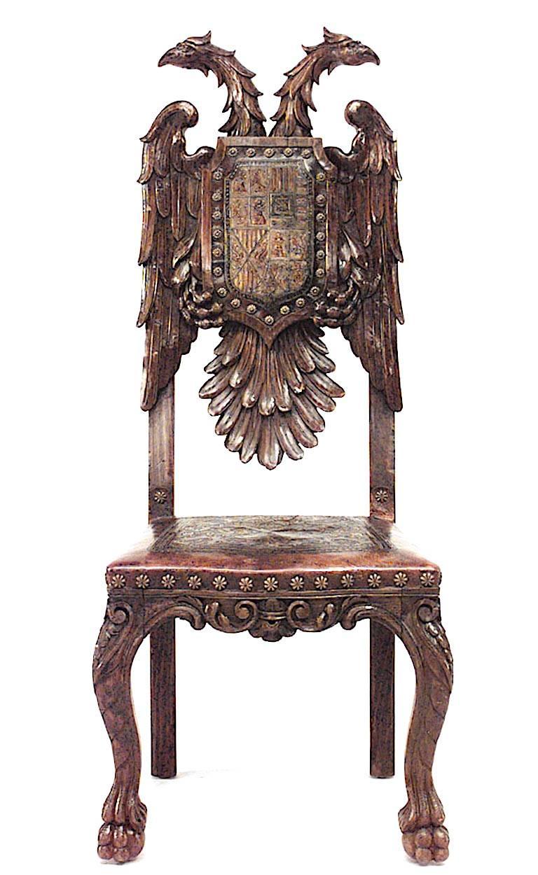 Pair of Continental Baroque style stained pine side chairs with Hapsburg double eagle carved back & armorial embossed leather upholstery (late 19th/20th Cent)
