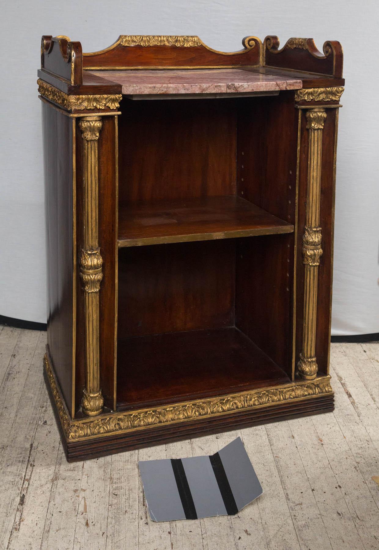 The pair of gold painted wood and mahogany. Painted wood carved columns within concave sides surround the open front. Removable marble top slides out, one shelf below adjustable.