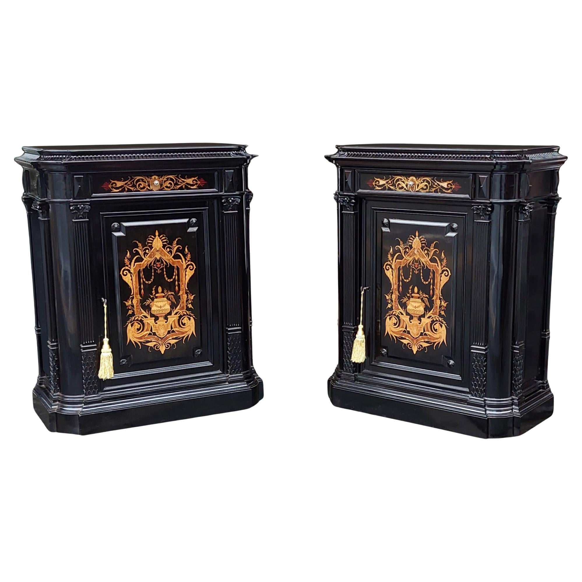 Pair of Continental Ebonized and  Inlaid Pier Cabinets