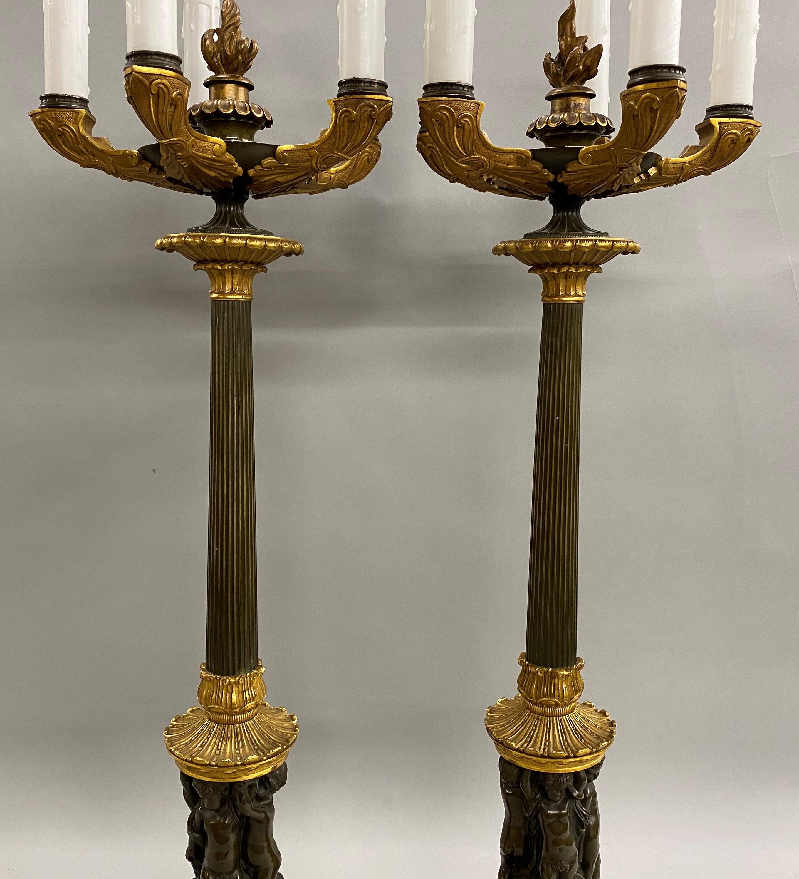 Pair of Continental Gilt and Bronze Five-Light Candelabra Lamps with Putti In Good Condition In Milford, NH