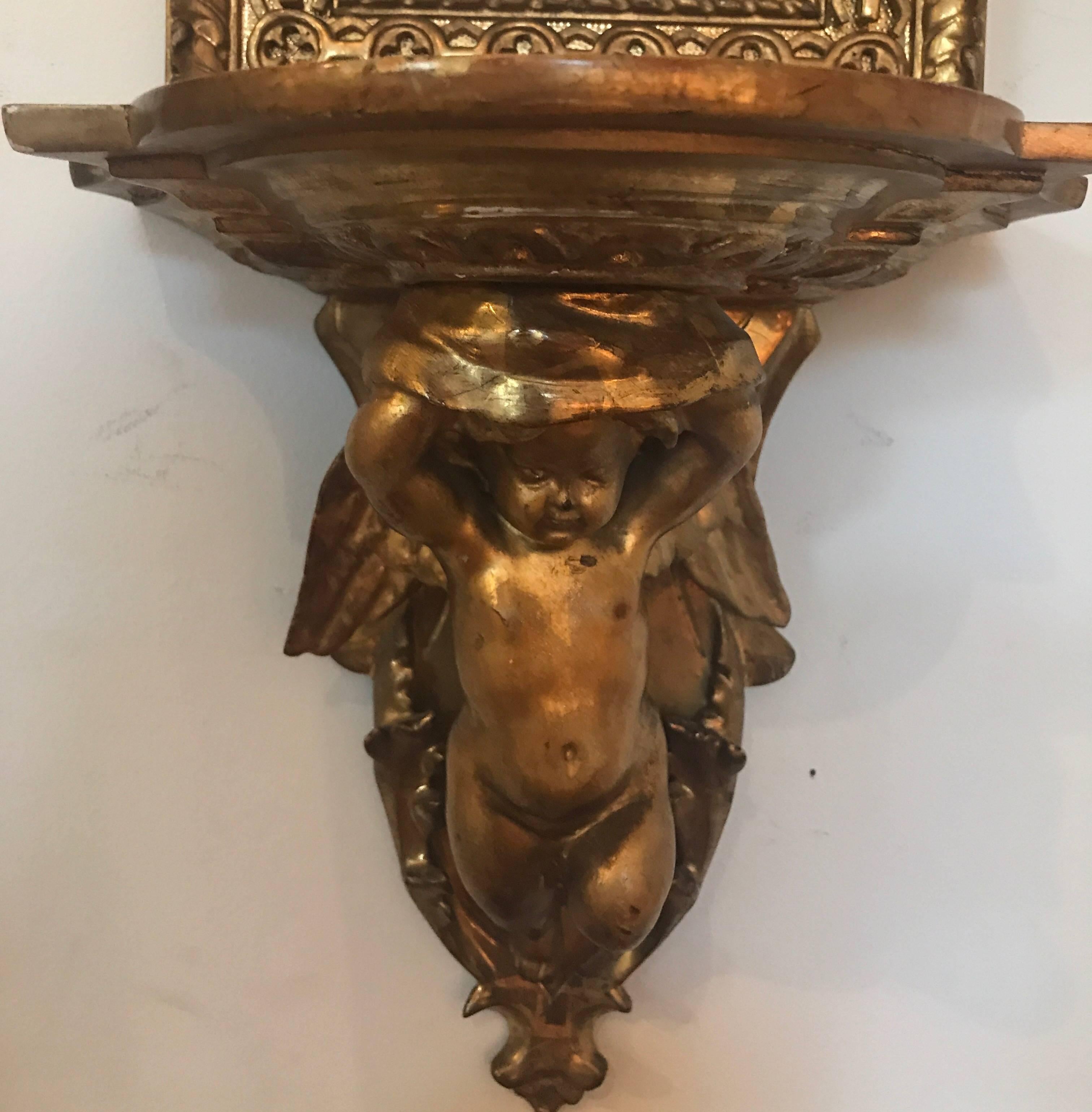 Pair of Continental Giltwood and Mirrored Sconces In Excellent Condition In Lambertville, NJ