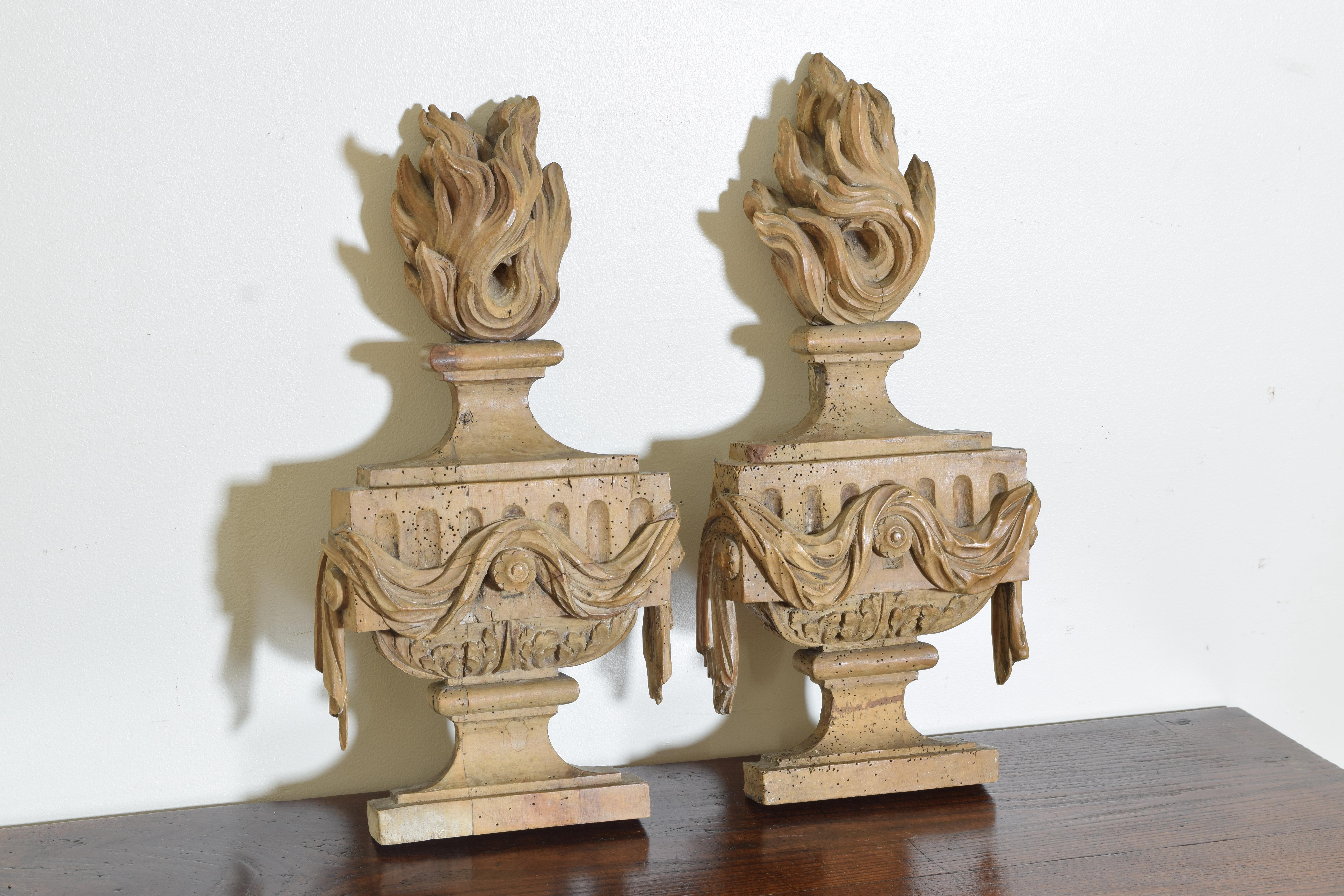 European Pair of Continental Neoclassical Carved Wooden Capitals, late 18th century
