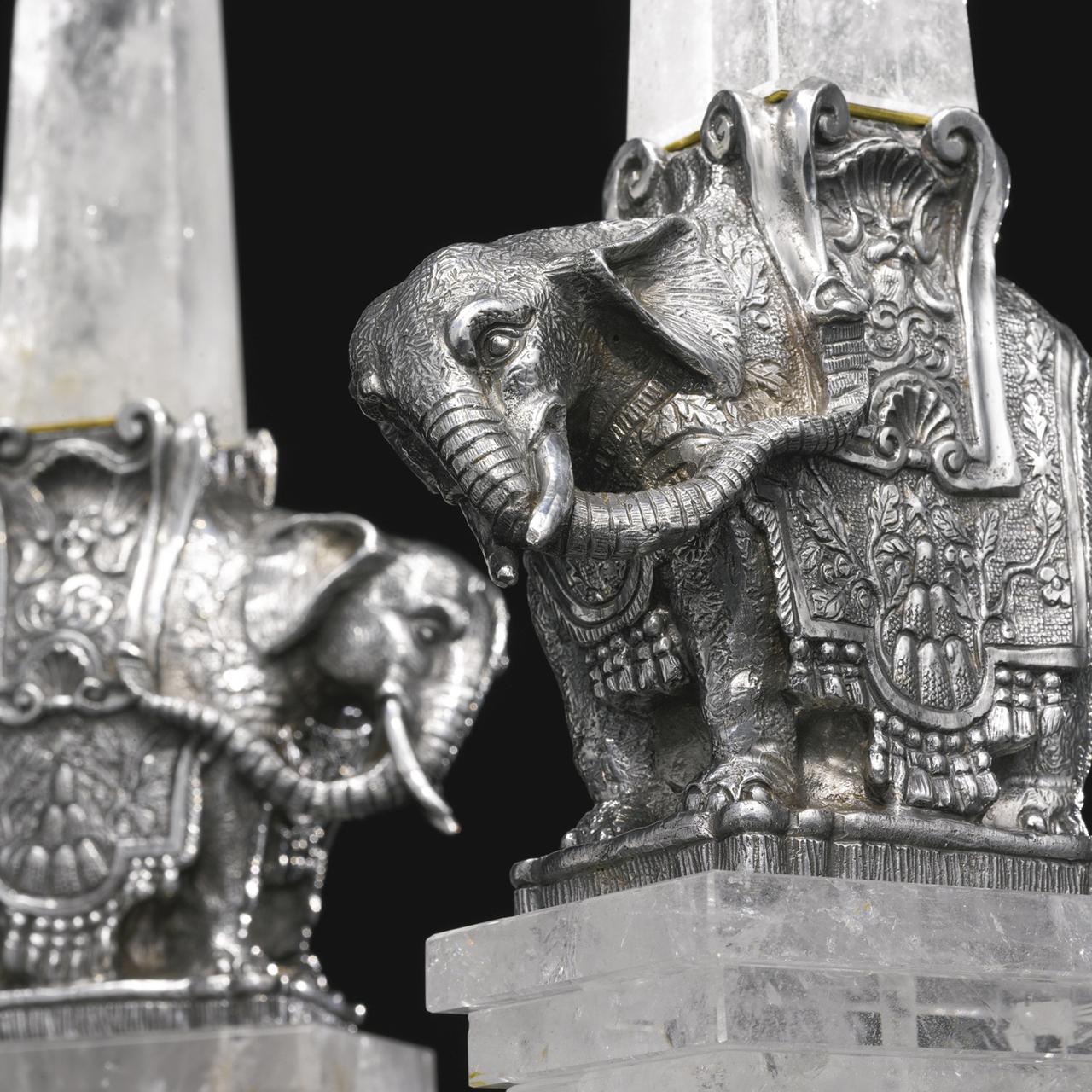 A fine quality pair of rock crystal obelisks on silvered bronze elephant form bases.