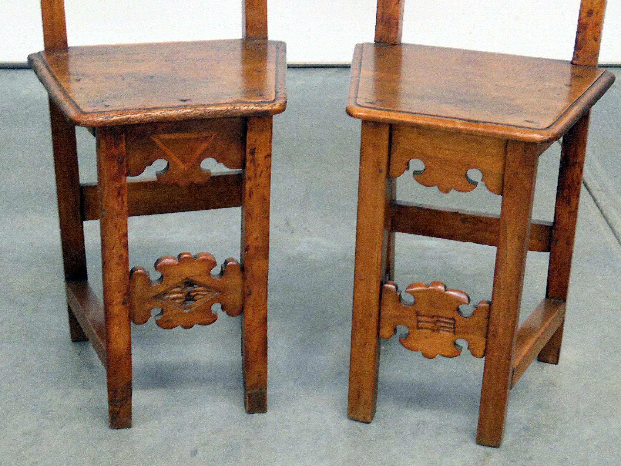 Pair of carved carved Italian Continental side chairs.