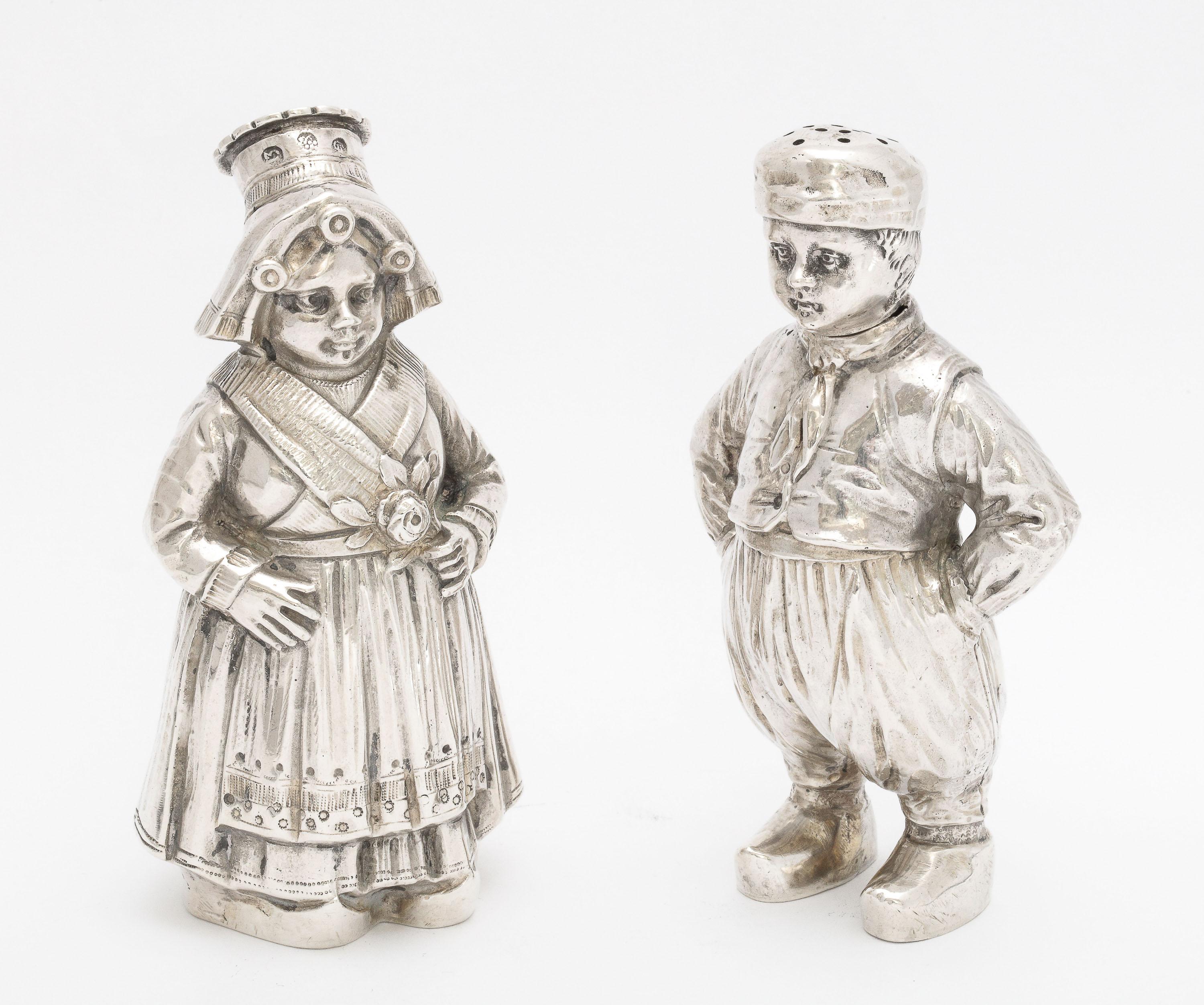 Edwardian Pair of Continental Silver '.835' Dutch Boy and Girl Salt and Pepper Shakers