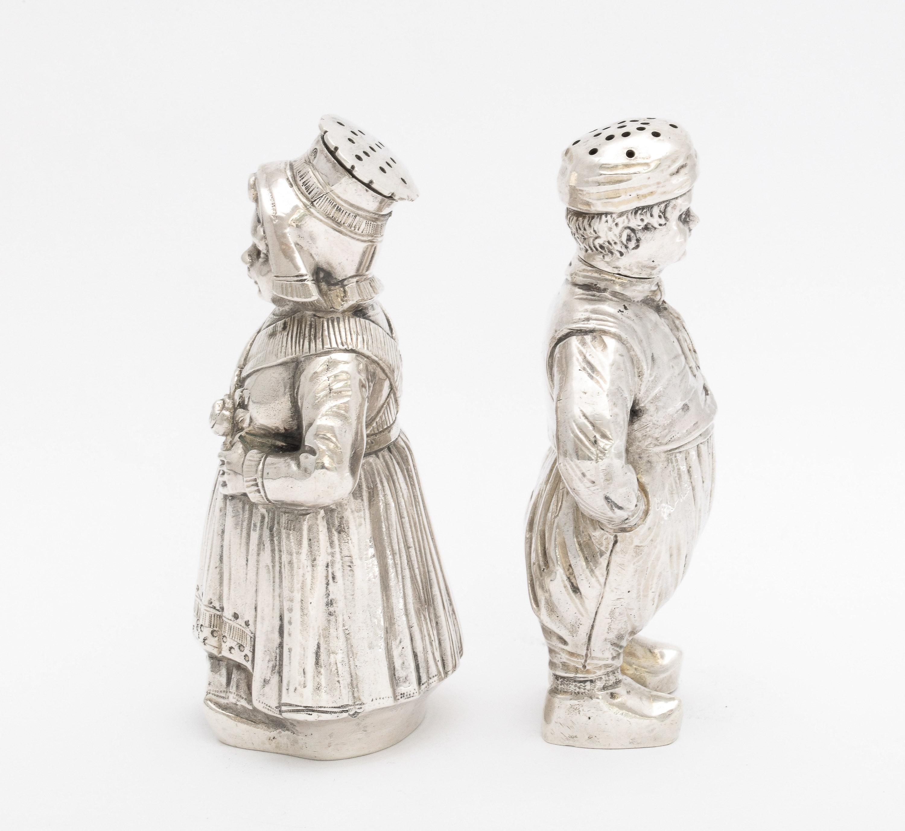 Pair of Continental Silver '.835' Dutch Boy and Girl Salt and Pepper Shakers In Good Condition In New York, NY
