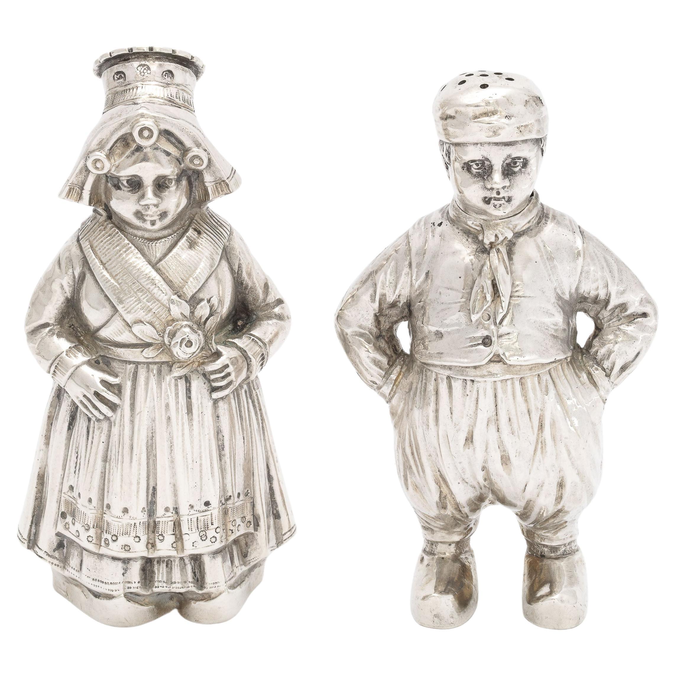 Pair of Continental Silver '.835' Dutch Boy and Girl Salt and Pepper Shakers