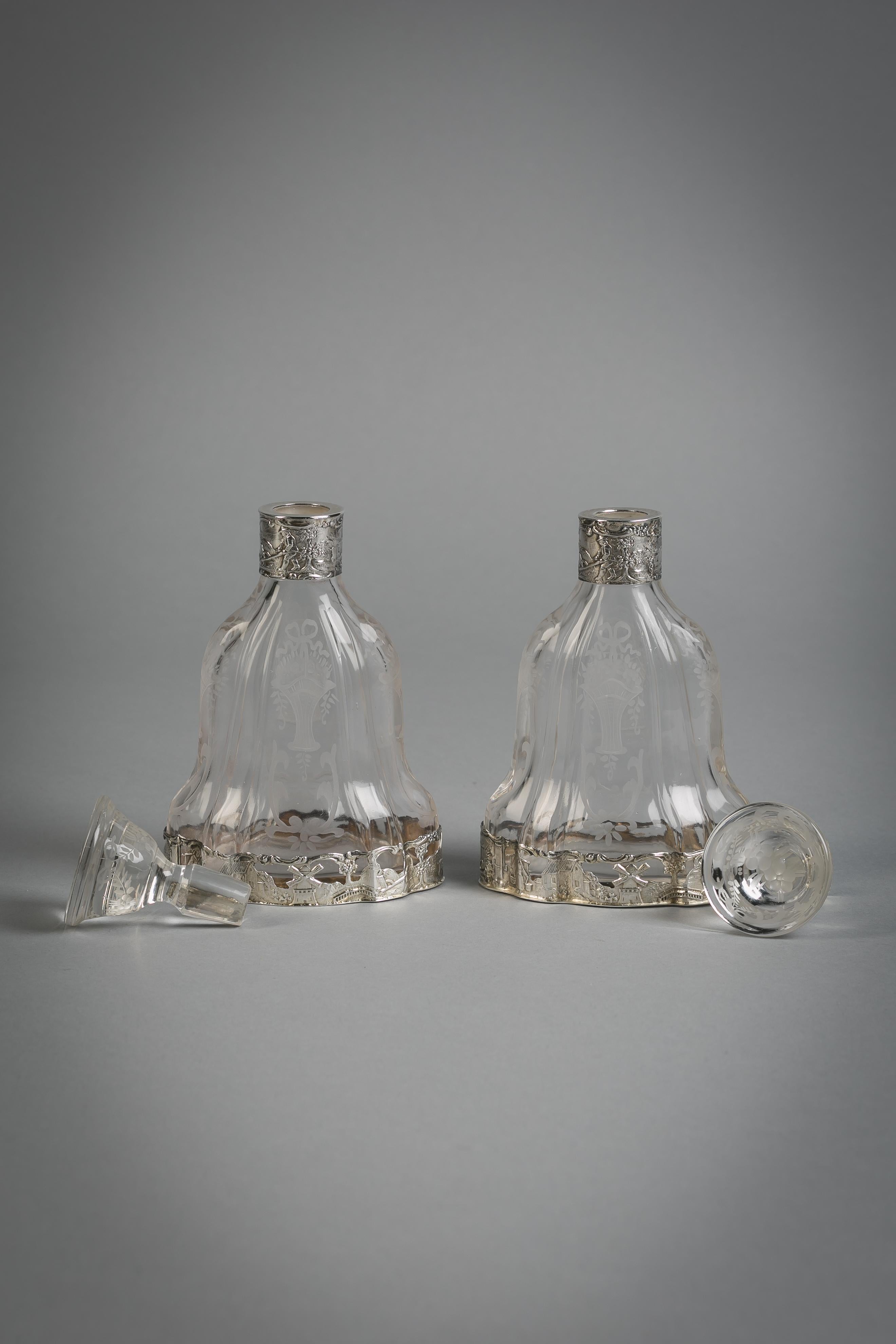 Pair of Continental silver and crystal perfume bottles, circa 1890.