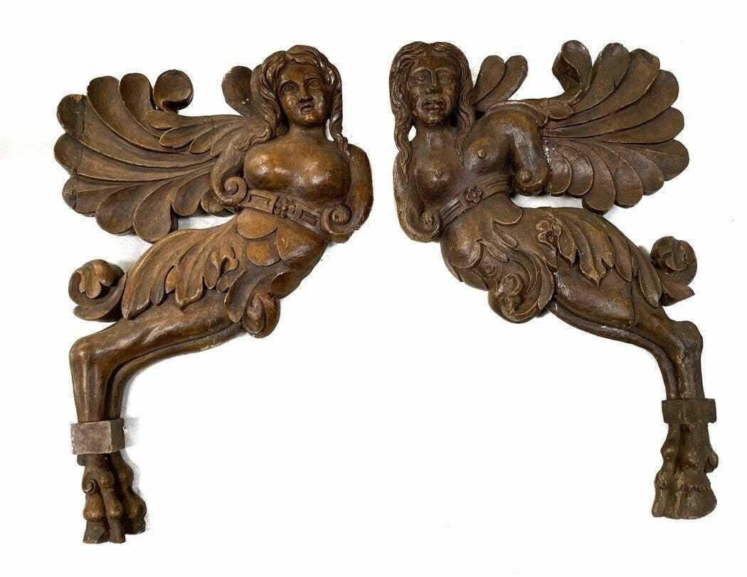 Pair of Continental Wooden Angelic Figures w/ Architectural Accents, circa 1800.

Large Continental carved wood Architectural Reliefs of Winged Partially Nude Figures with Hoofed feet. 19th Century.

Additional Information:
Material: