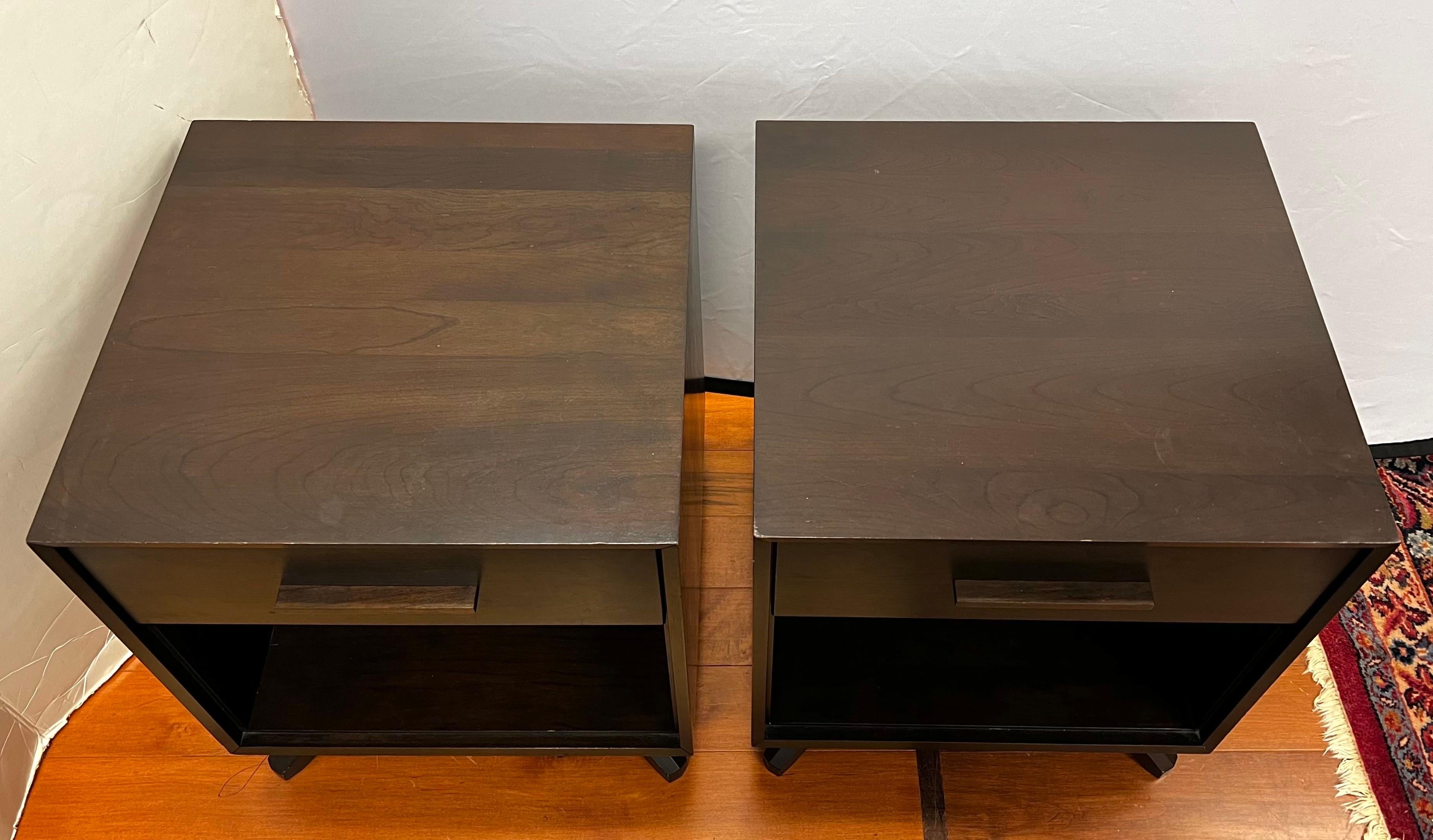 Pair of Copeland Furniture Catalina nightstands combines clean, unadrned lines of the International Modernists with organic and geometric forms.  Features soft-close, self close drawer glides and crafted in solid cherry wood with smoked cherry