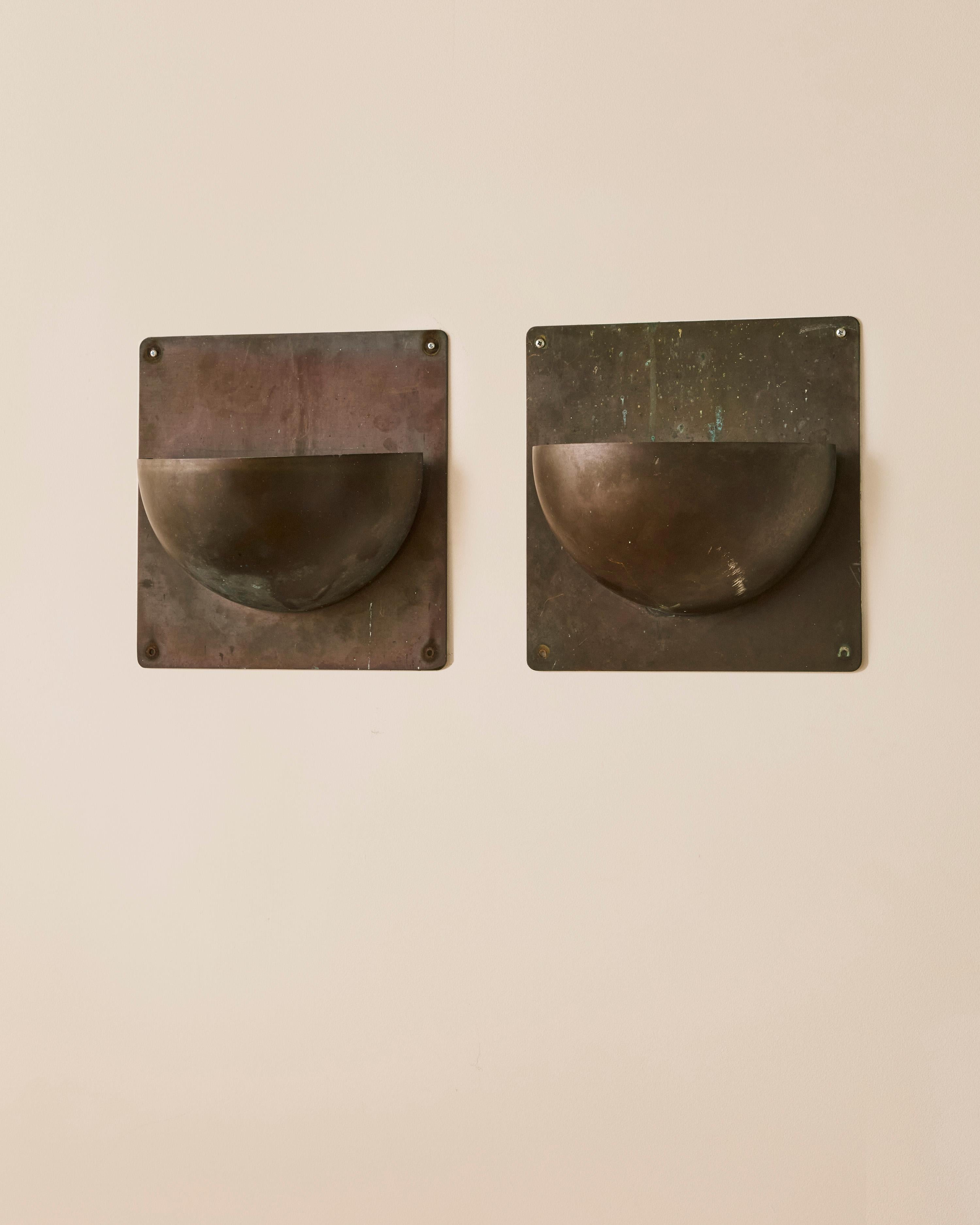 Pair of patinated copper Danish sconces by Torsten Thorup & Claus Bonderup c. 1960's. The sconces can be mounted in an upward or downward light orientation.