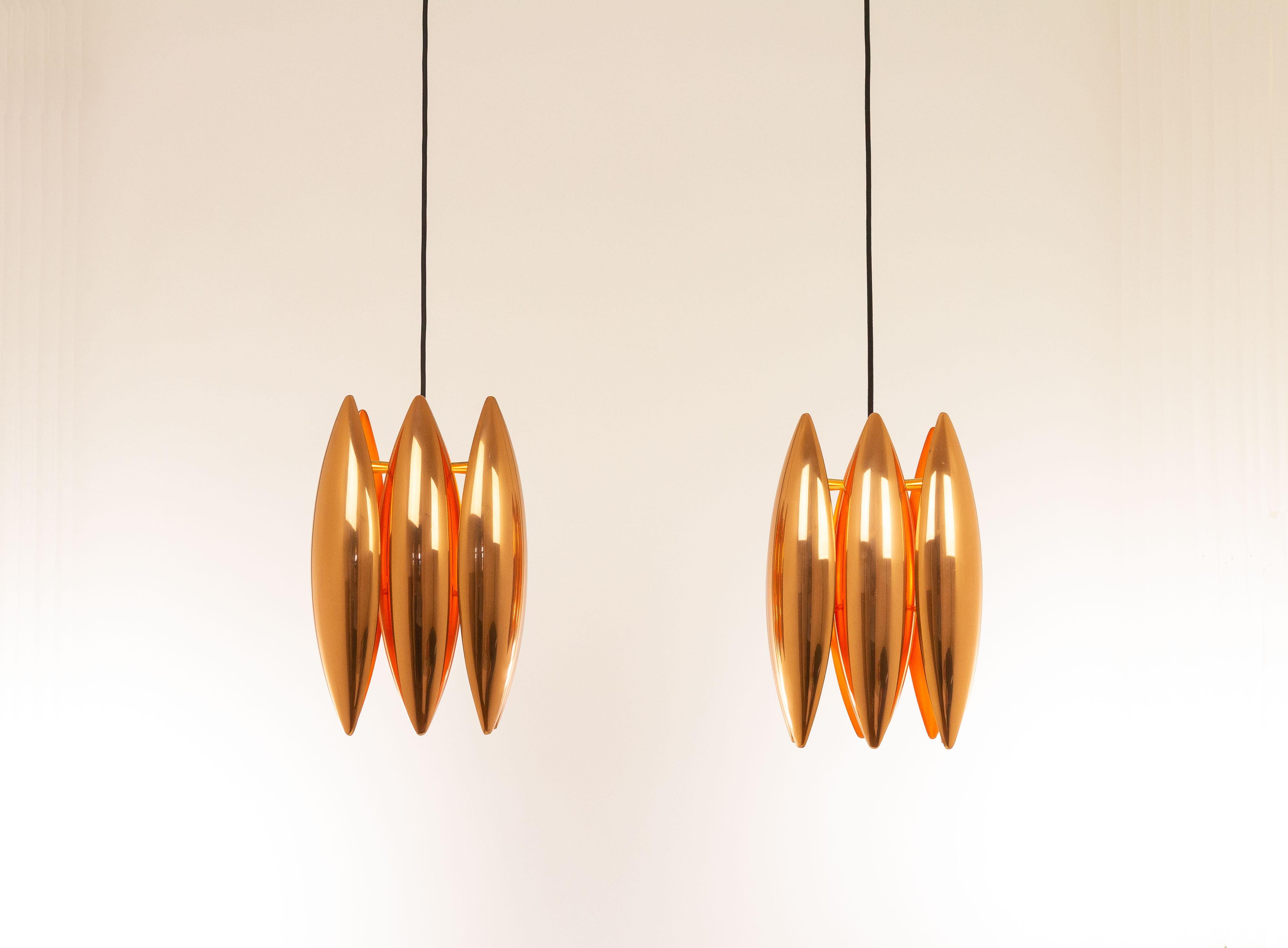 Jo Hammerborg designed the 'Kastor' pendant for Danish manufacturer Fog & Mørup.

The 'Kastor' series consisted of three different models: a pendant, a wall lamp and a floor lamp, all executed in solid copper or brass. The striking brass models