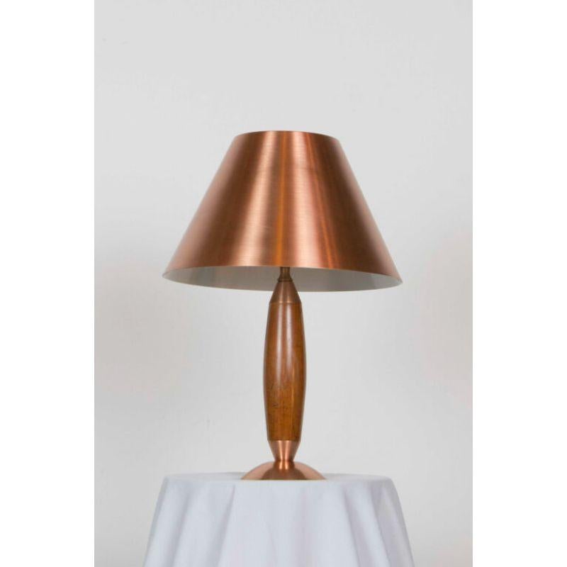 New Old Stock Lamps. They were hidden for 60 years in storage, and have been hand refinished and rewired. Solid wood and copper with original copper shade. Part of the “Masterline” line of lamps by the Electical Specialty Co. of Boston MA. C. 1950.