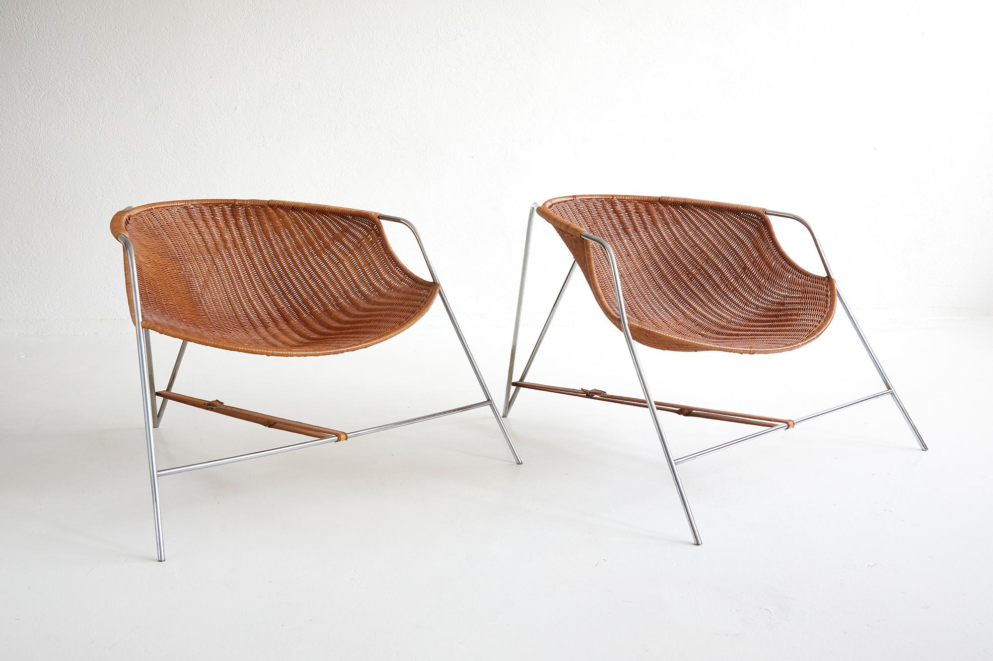 This gorgeous pair of armchairs was designed by the Spanish designer and sculptor Pete Sans and produced by BD Barcelona. 

The Spanish company founded in 1972 has produced designs by Alvaro Siza, Pepe Cortes and Alessandro Mendini, among